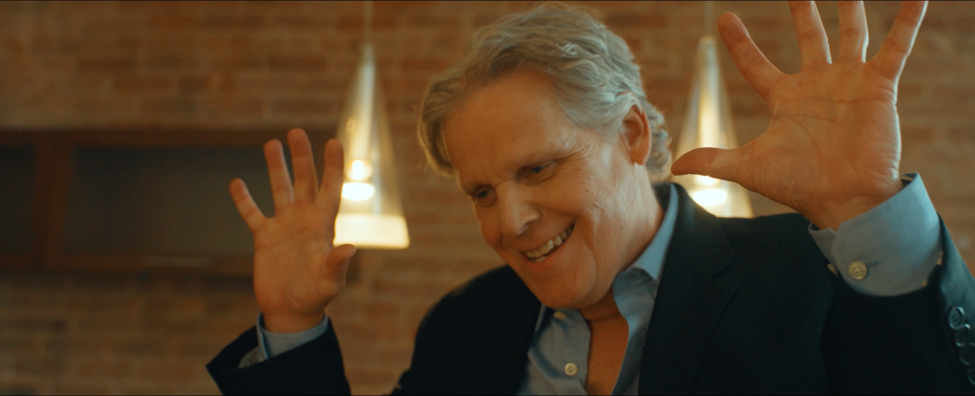 Middleman raises his hands in surrender