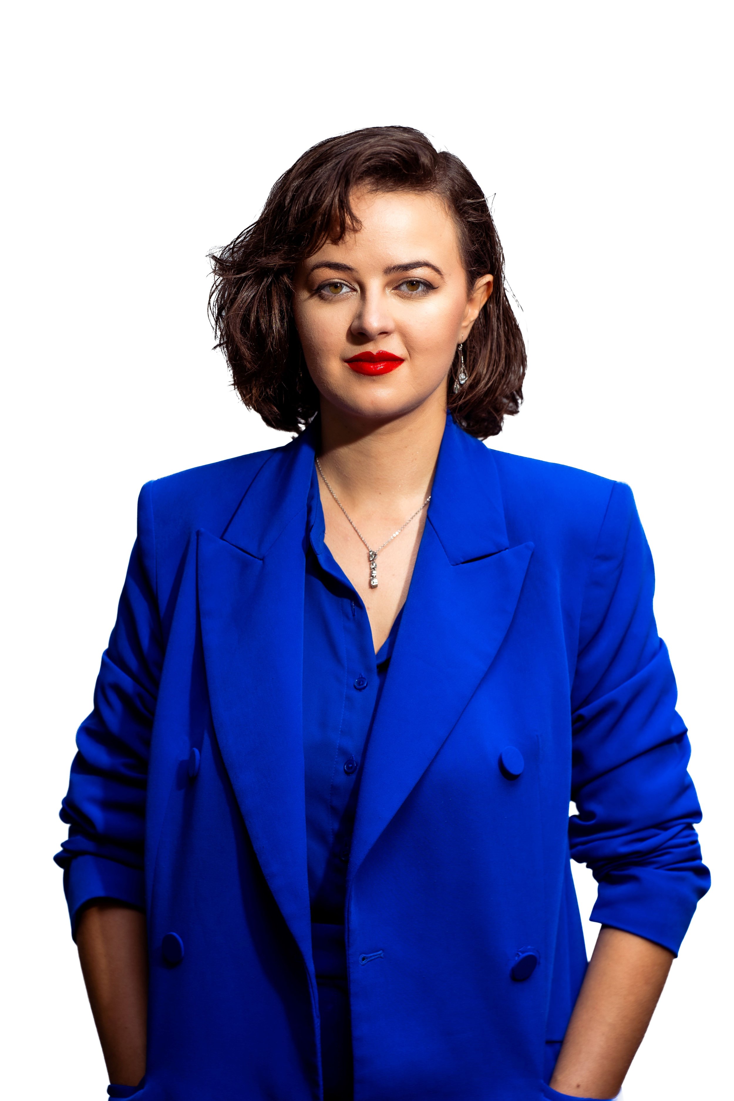 White woman in royal blue suit