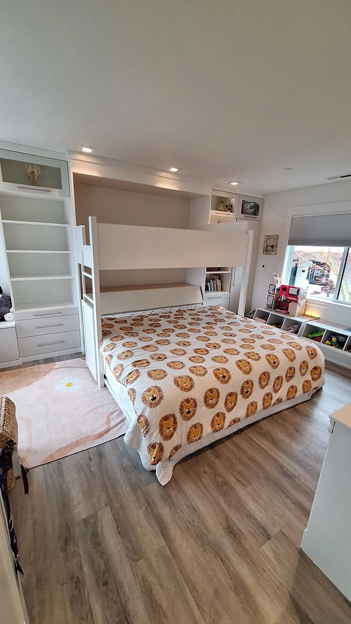 White loft bed with built-in storage and powder-coated steel ladder
