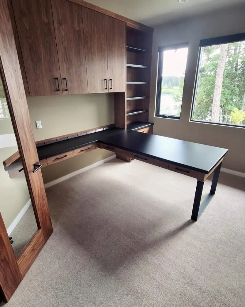 Walnut office built-ins with black metal desk