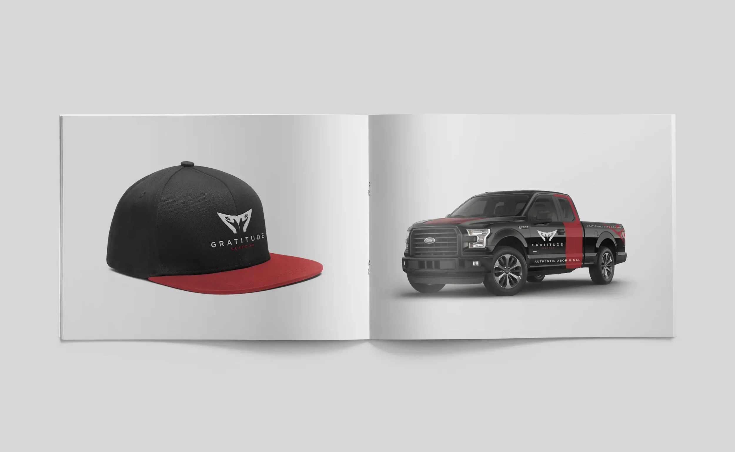 Inside spread of Gratitude Seafood brand guideline showing application on a blacm and red snapback hat and Ford F150 Livery