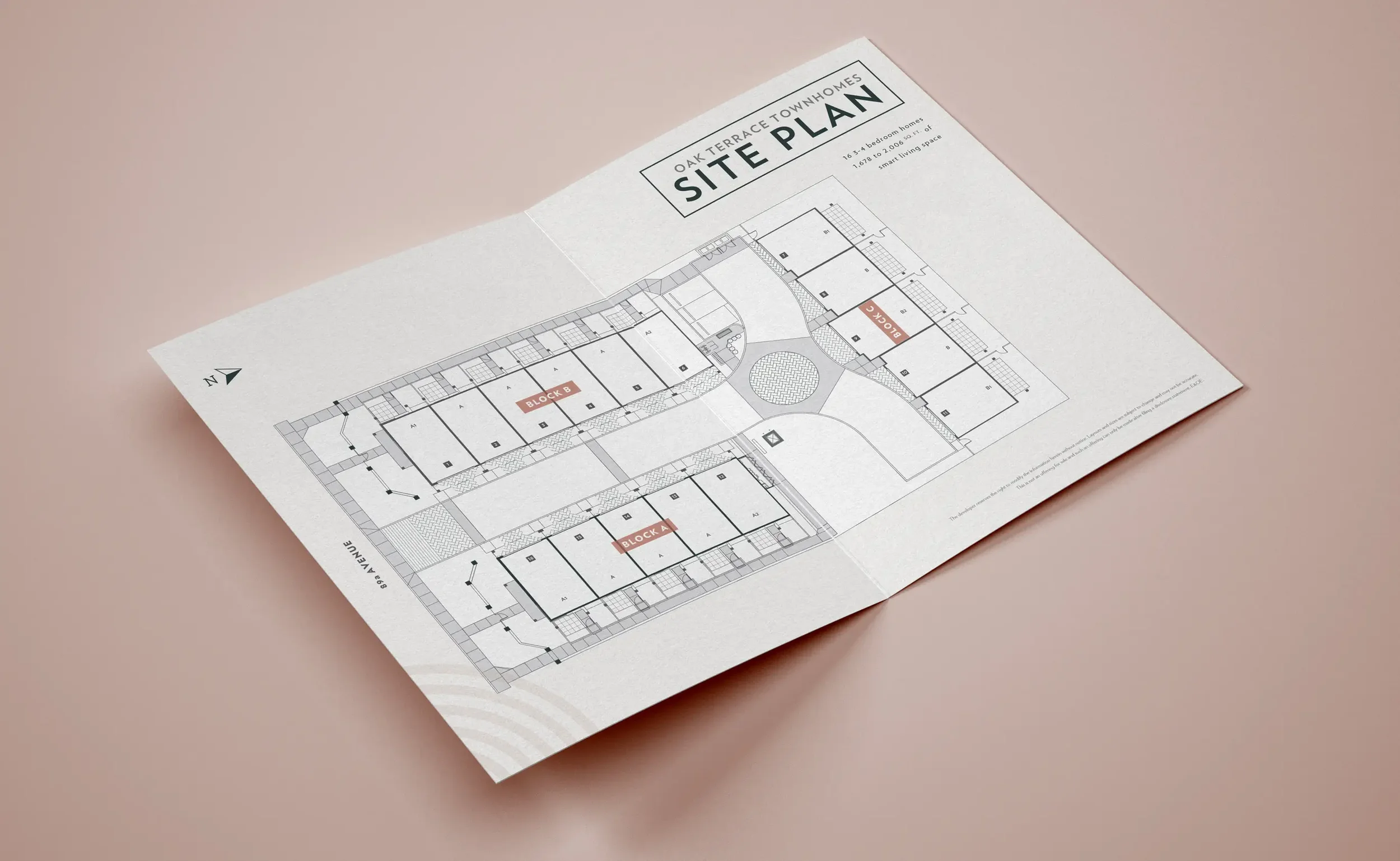 Folded handout in neutral colours showing the site plan of the townhome development