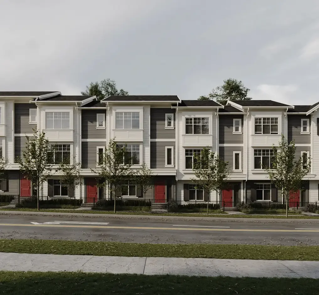 Exterior rendering of a row of townhomes in fall with moody skies