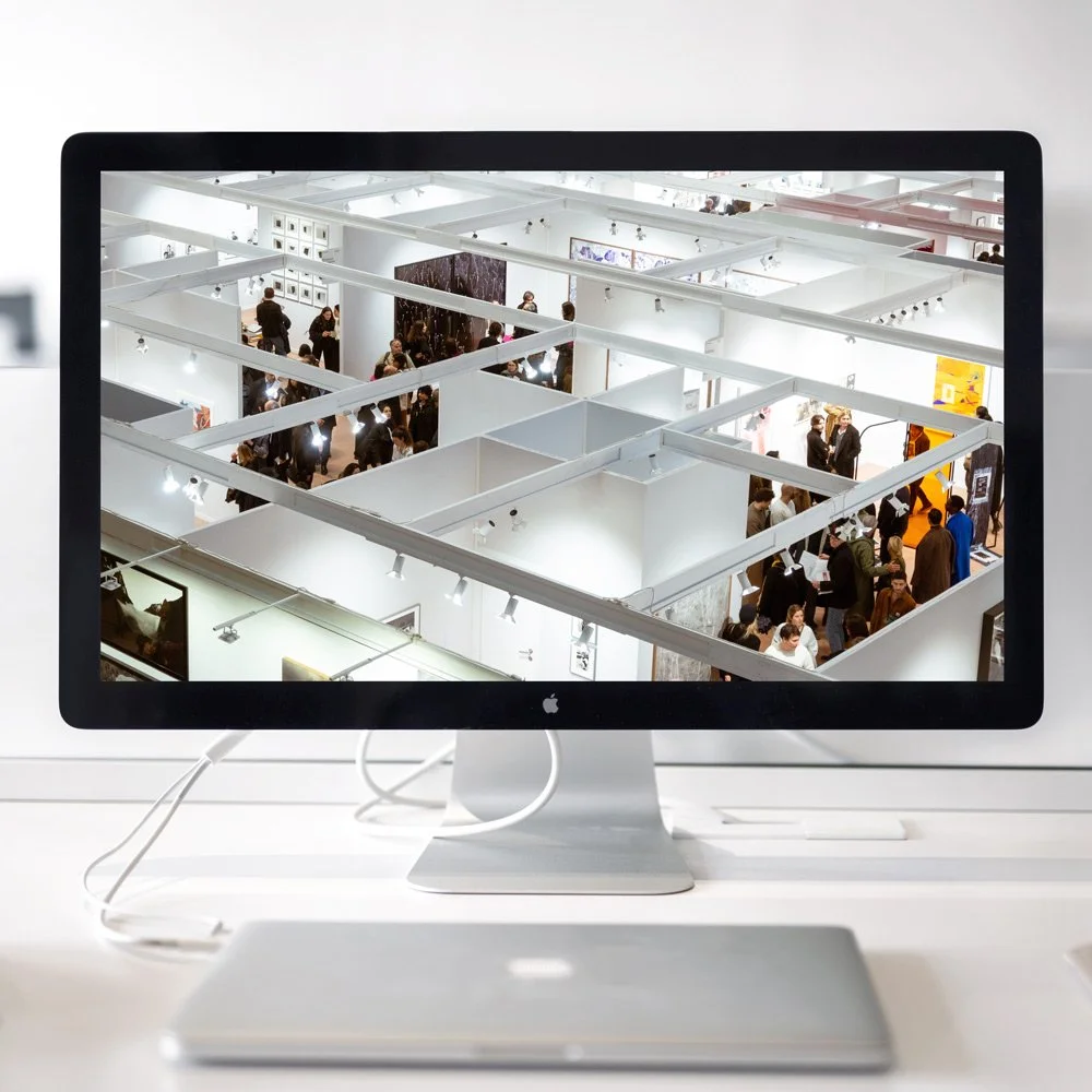 computer with an image of a complicated conference room display