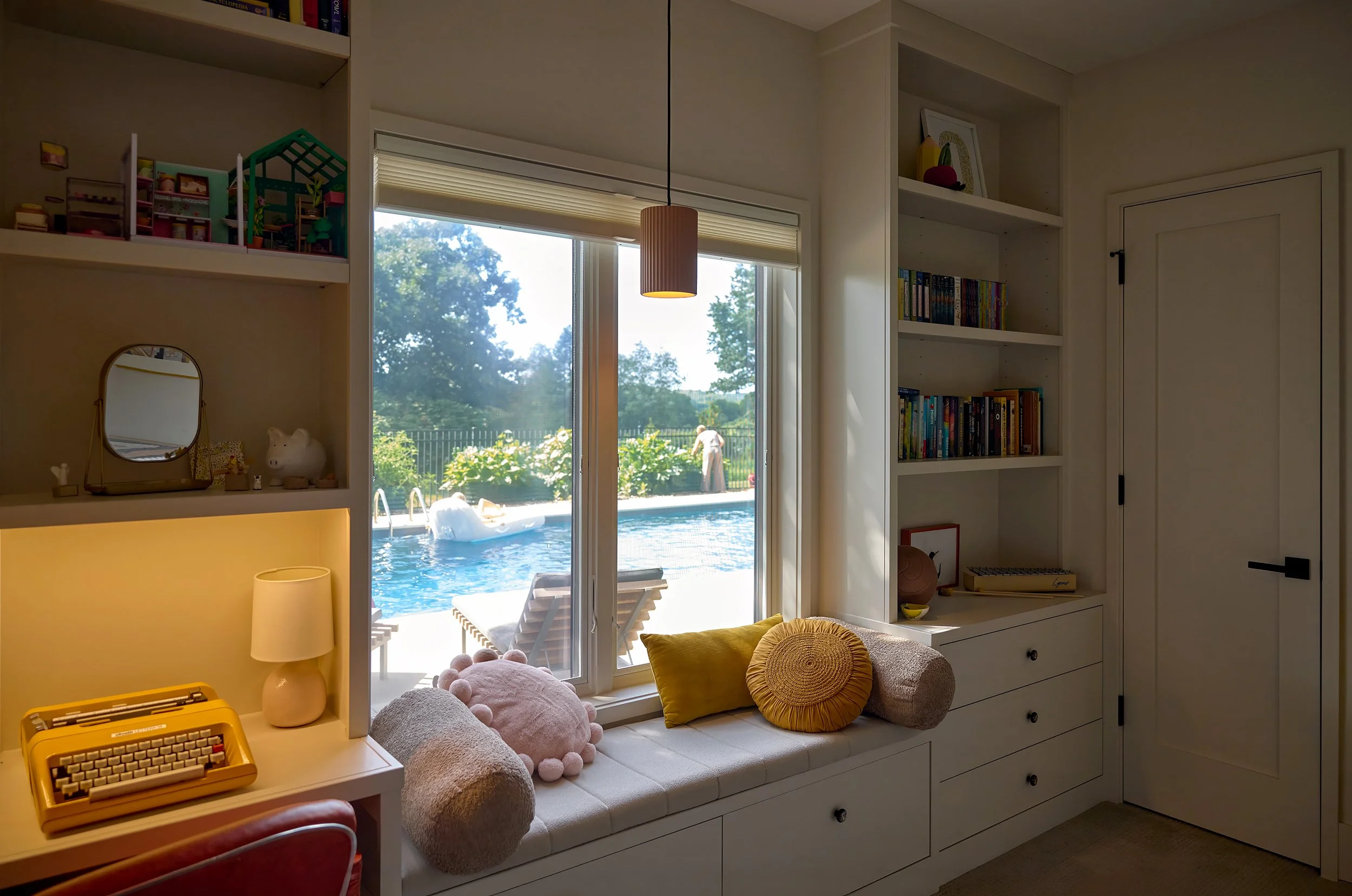 Guest bedroom overlooking swimming pool