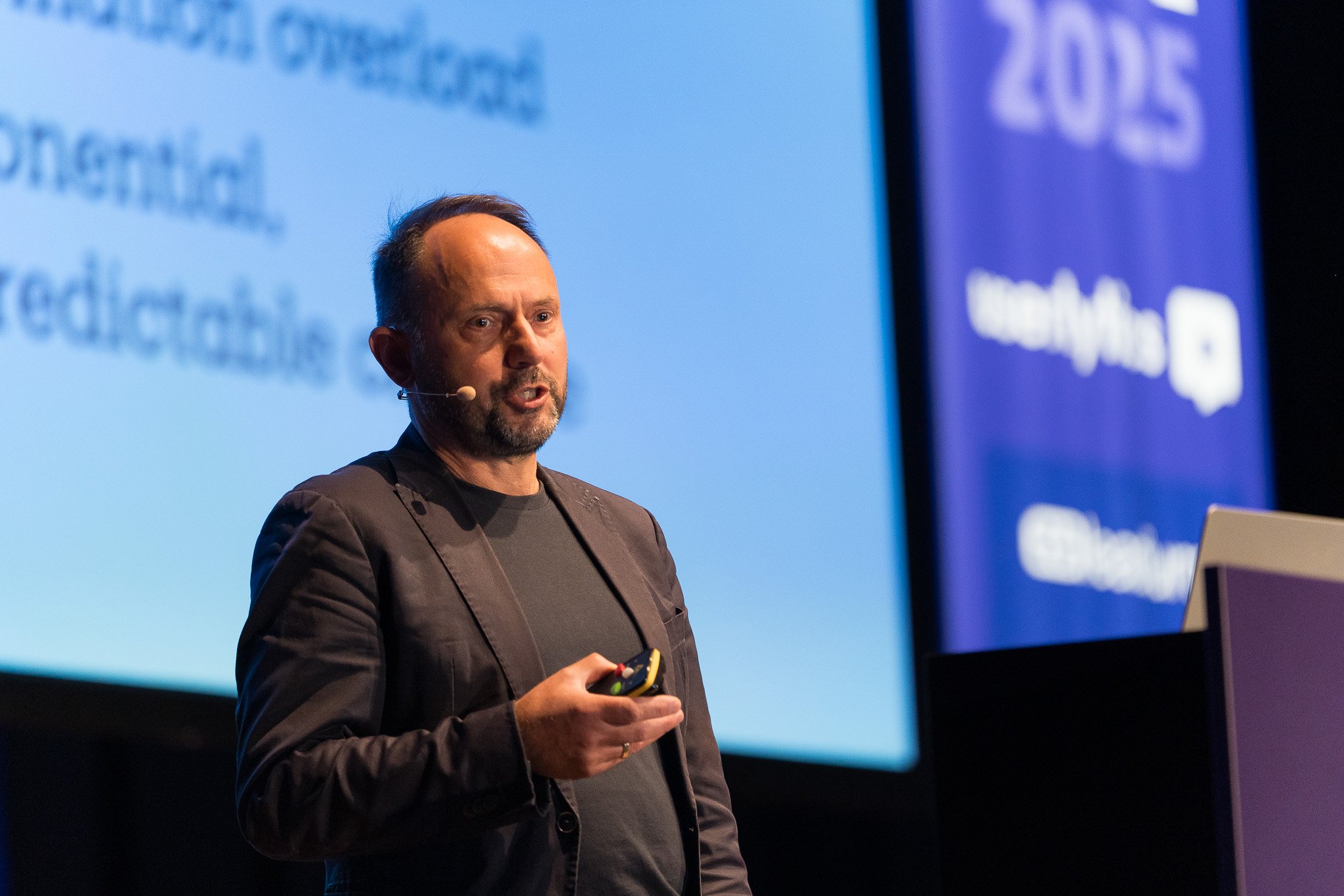Sven-Anwar on stage giving a speech at Push UX 2025