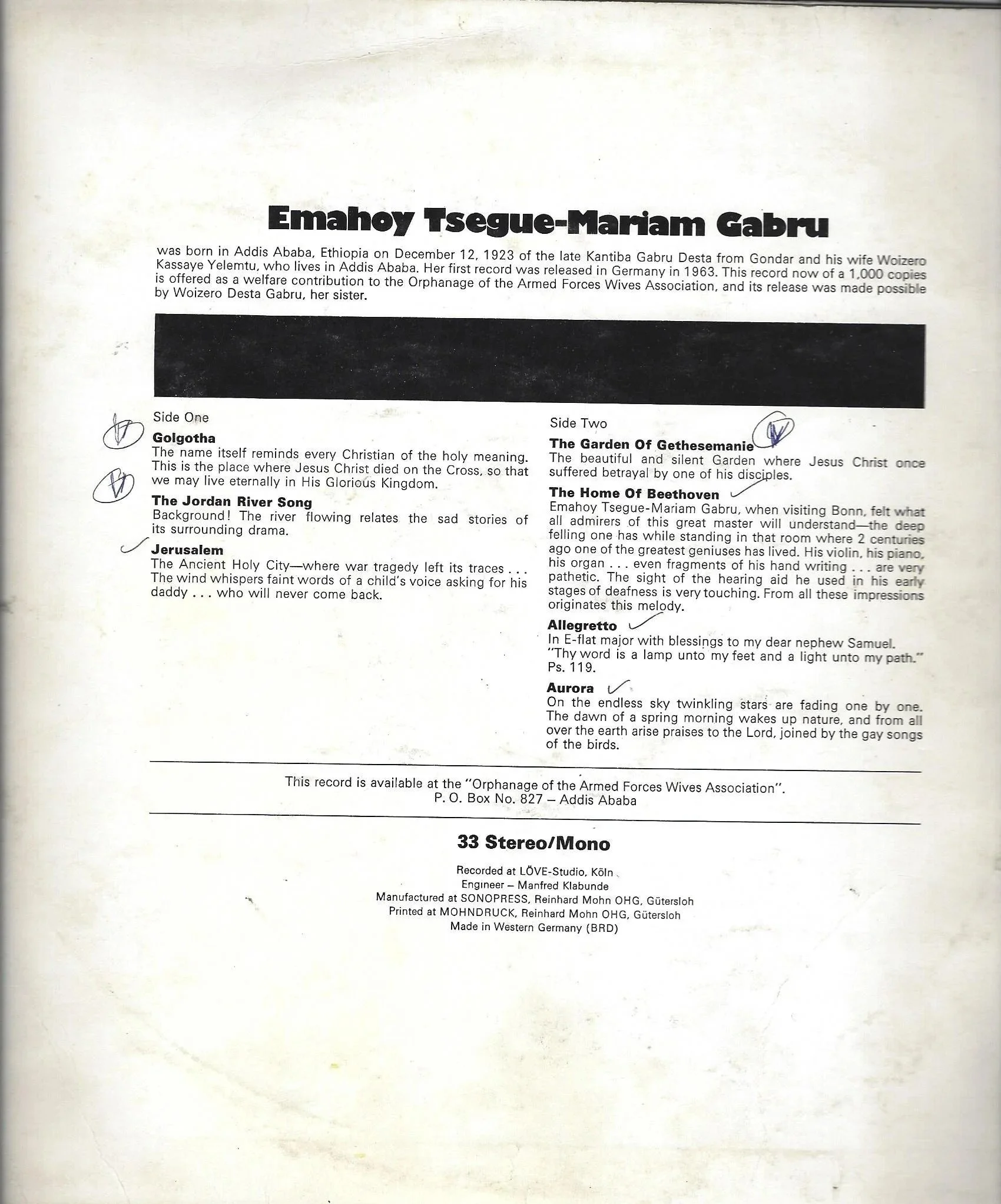 A document about Emahoy Tsege-Mariam Gabru, listing her background and recordings, with handwritten checkmarks and signatures next to several song titles.