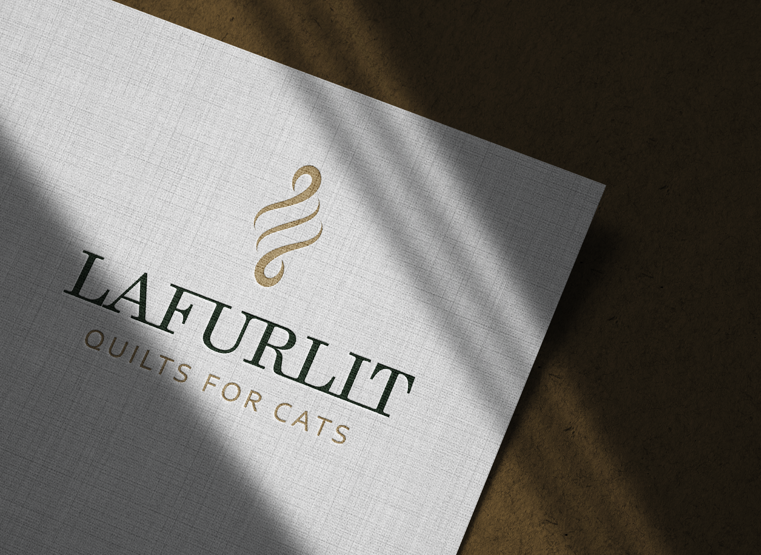 A white quilt with the logo and text for LaHurLIT quilts for cats.