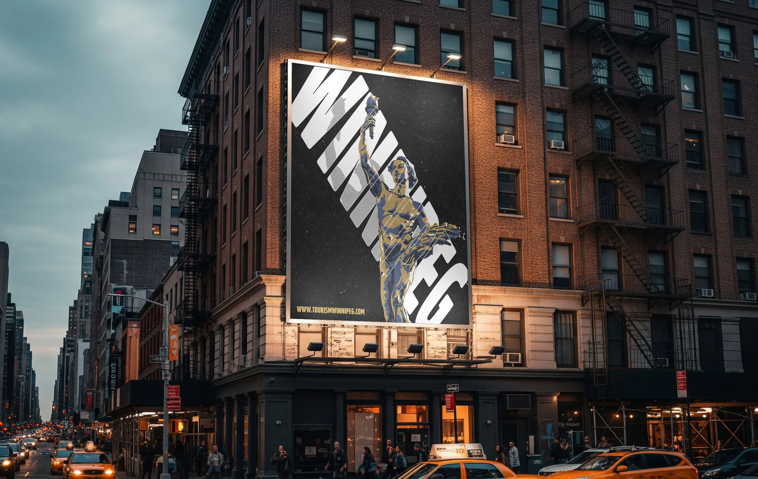 A large billboard on the corner of a brick building shows an artistic depiction of a woman holding a sword, resembling the Statue of Liberty, with a black background and abstract white shapes. The scene is in an urban setting during dusk with city traffic and pedestrians.