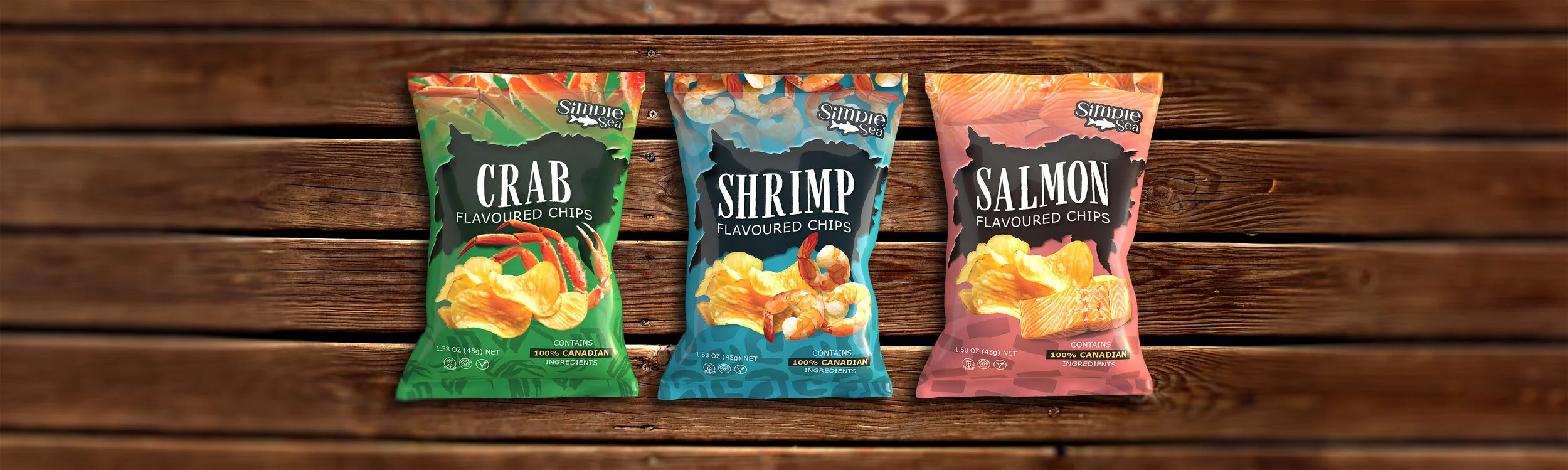 Three bags of flavored chips (crab, shrimp, and salmon) on a wooden surface.