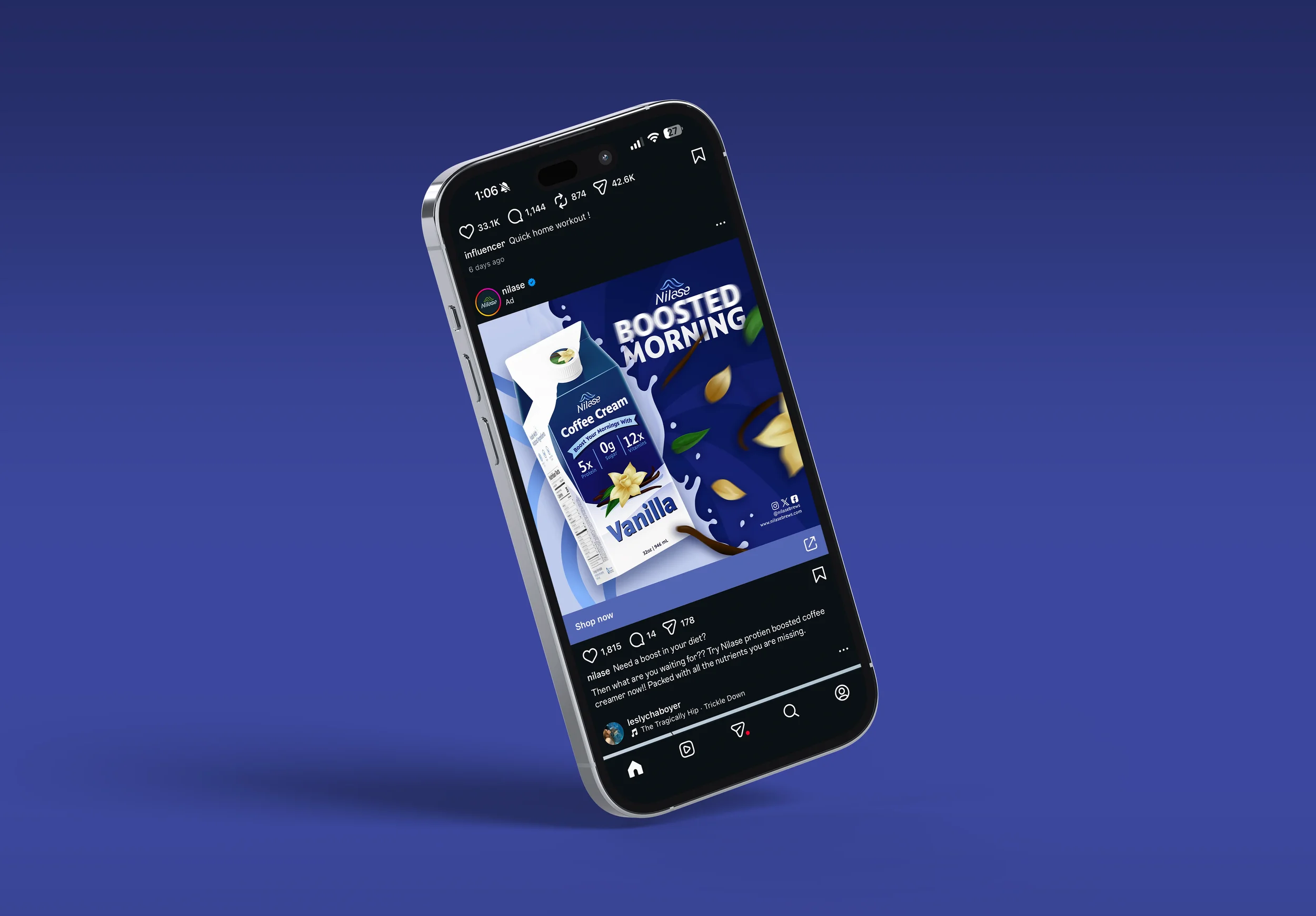 Smartphone displaying an advertisement for Nilase coffee cream with vanilla flavor, set against a dark blue background.