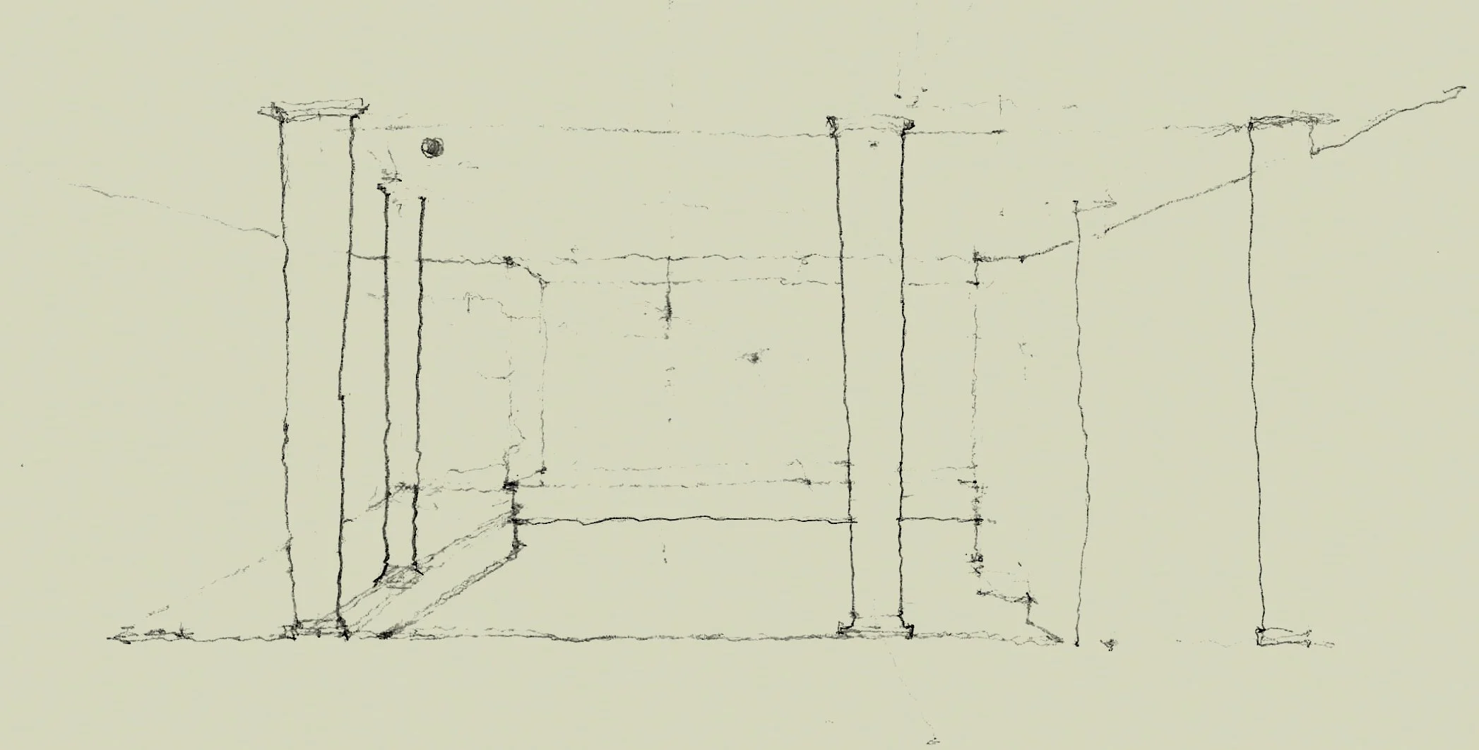 Sketch of a room or architectural space with columns and lines indicating walls and structural elements.