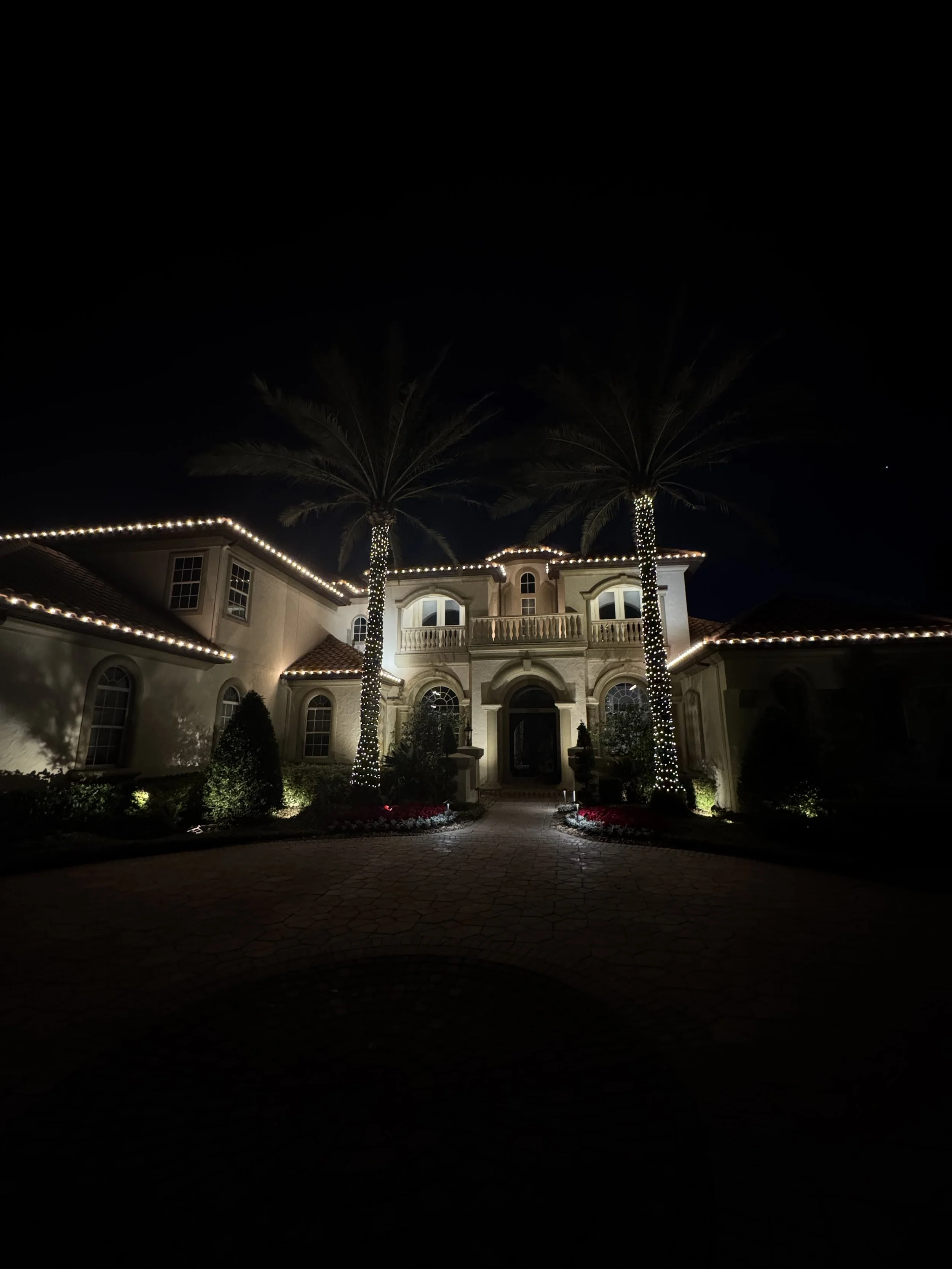 Luxury Central Florida home with professionally installed warm white Christmas lights