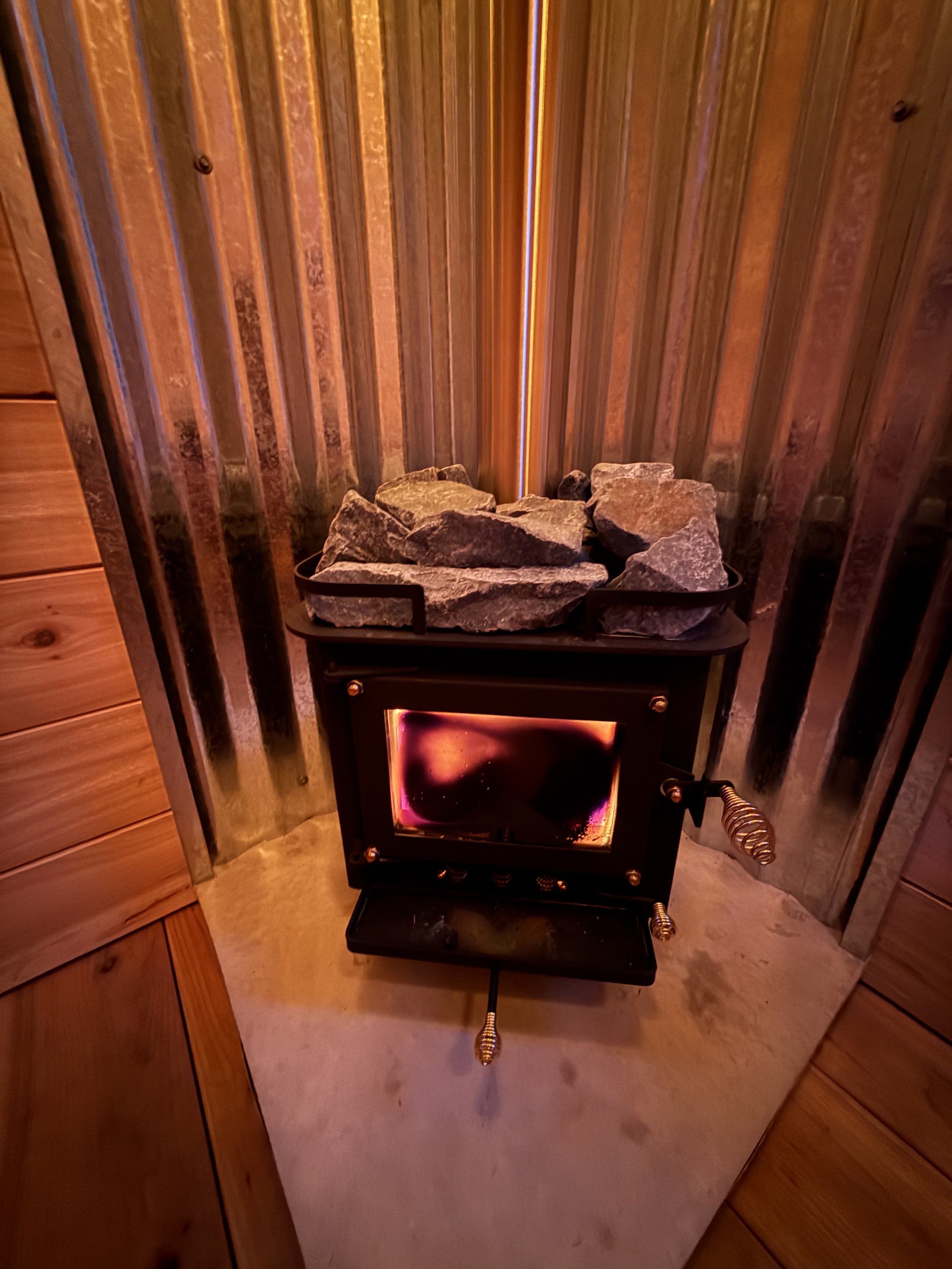 Custom Sauna with cold plunge, built by CUB Saunas, with small wood fired stove, in Stevensville, Montana