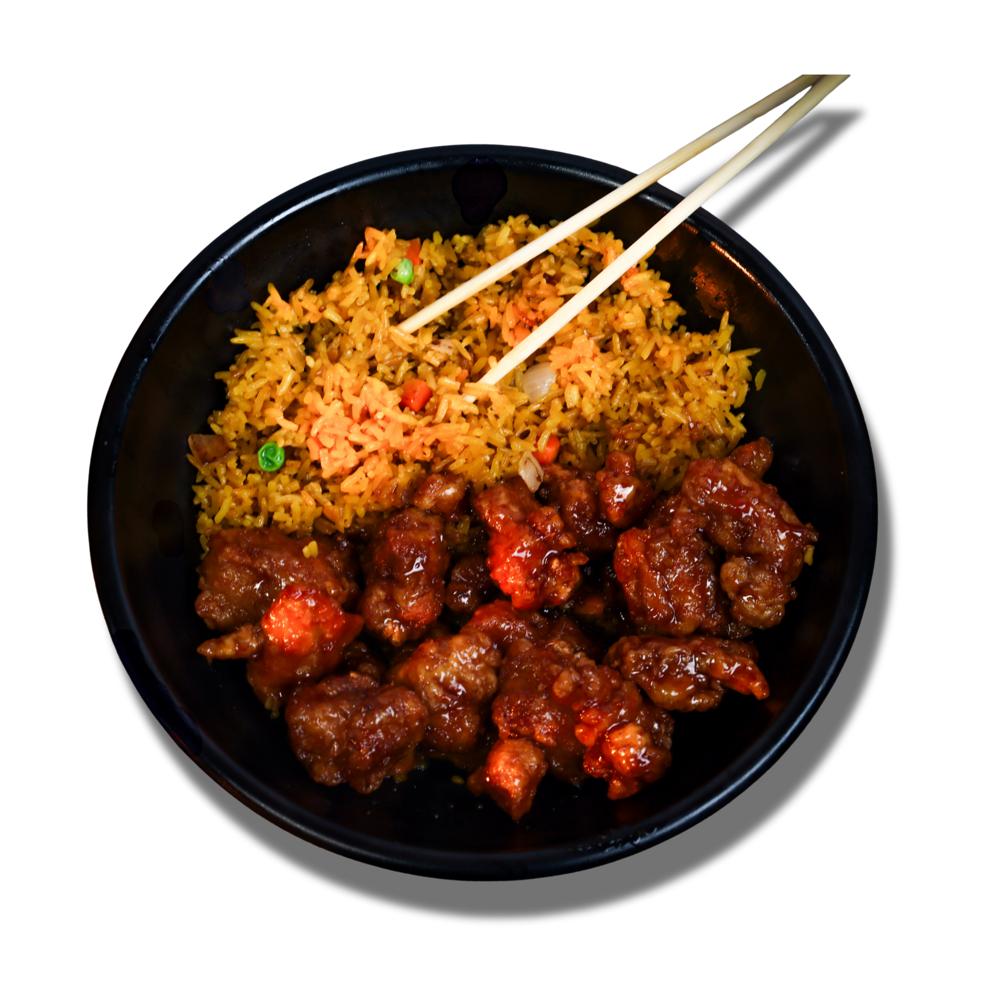 A black bowl filled with fried rice with vegetables and chunks of glazed meat, and a pair of chopsticks resting on top, set against a black background.