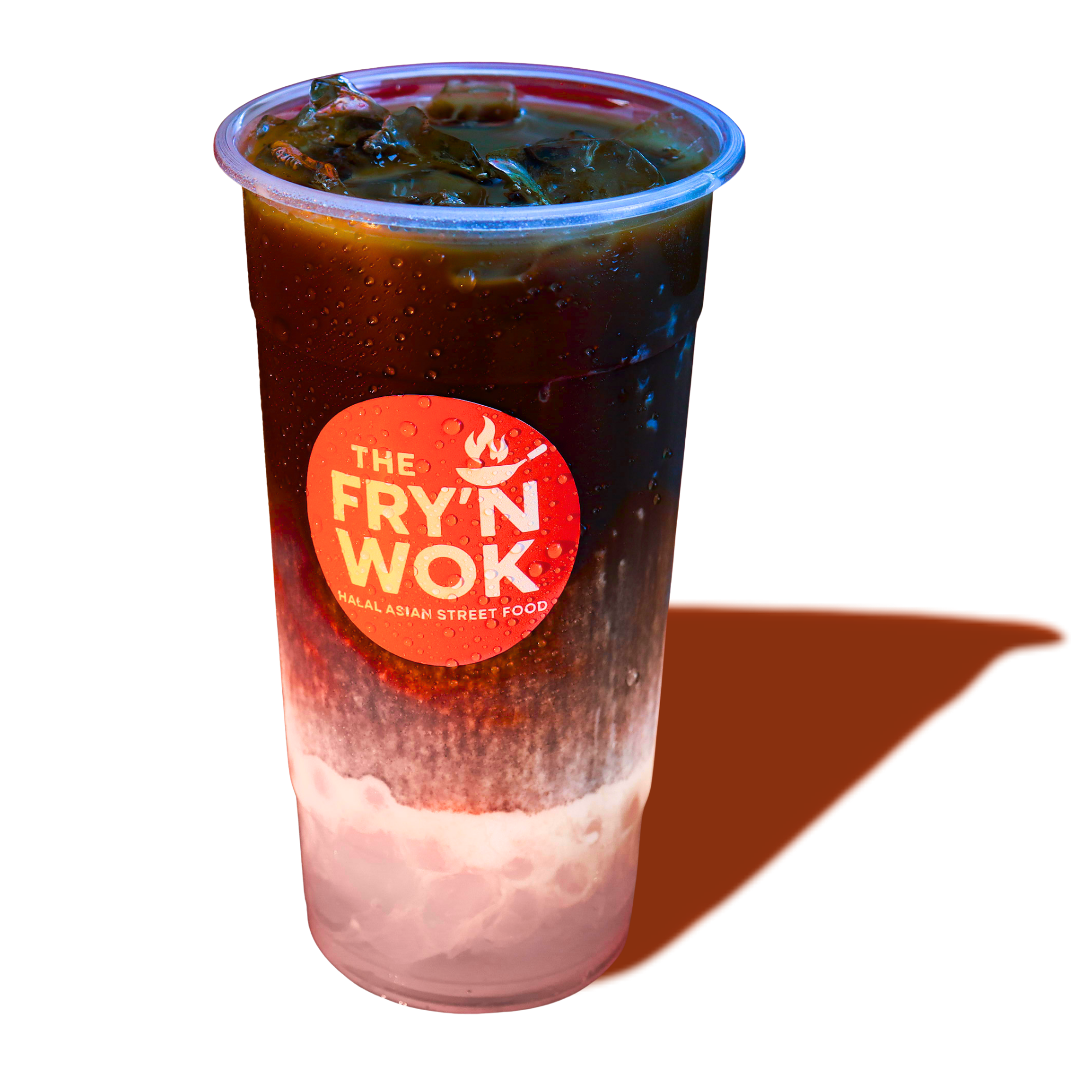 A plastic cup filled with a dark, carbonated beverage with ice, branded with 'The Fryn Wok' logo, placed on a reflective surface.