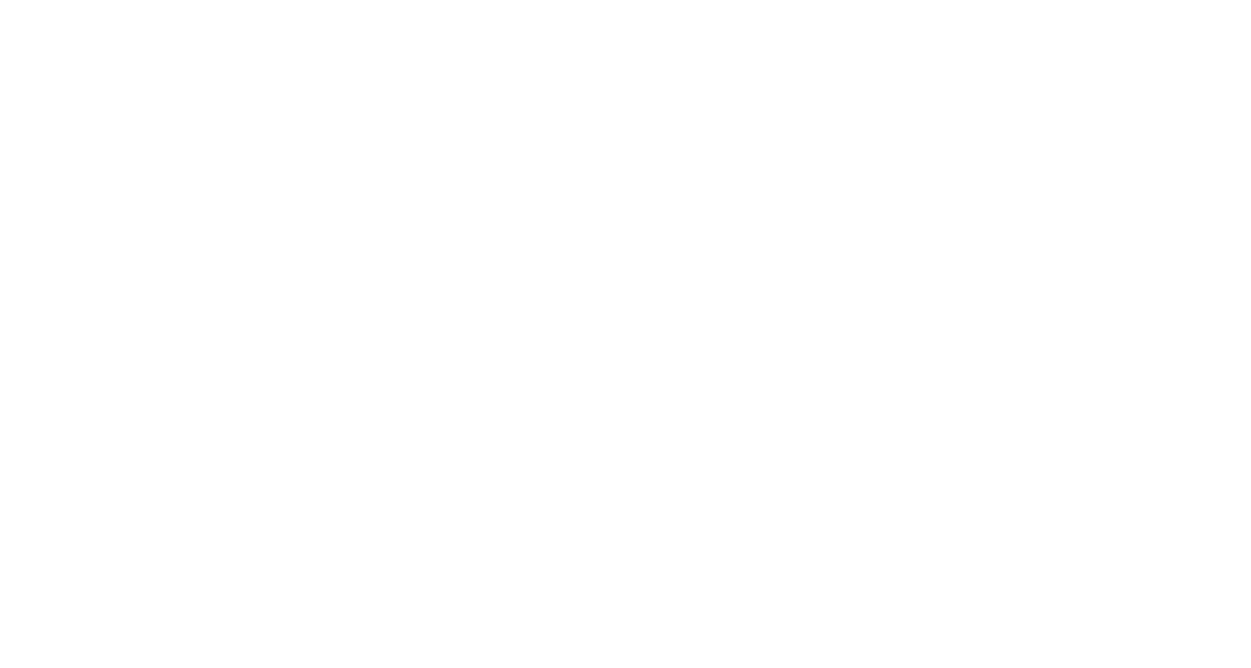 Outline of a tax document with the word 'TAX' at the top, flanked by two circular symbols representing a maple leaf and a United States flag.