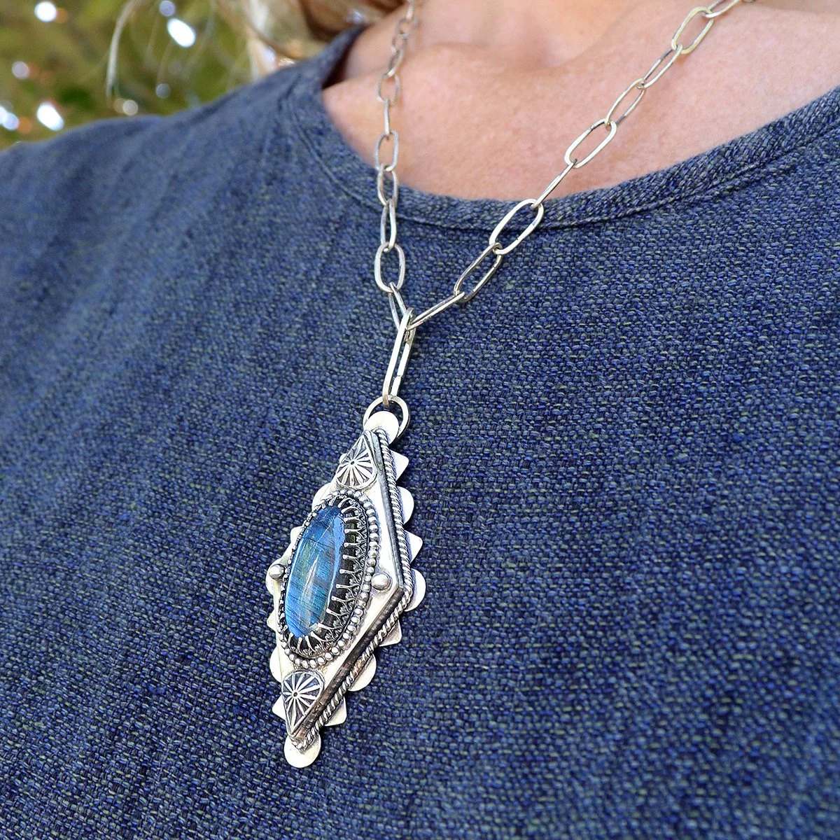 Hollow Form Diamond Labradorite Pendant-model.jpg
