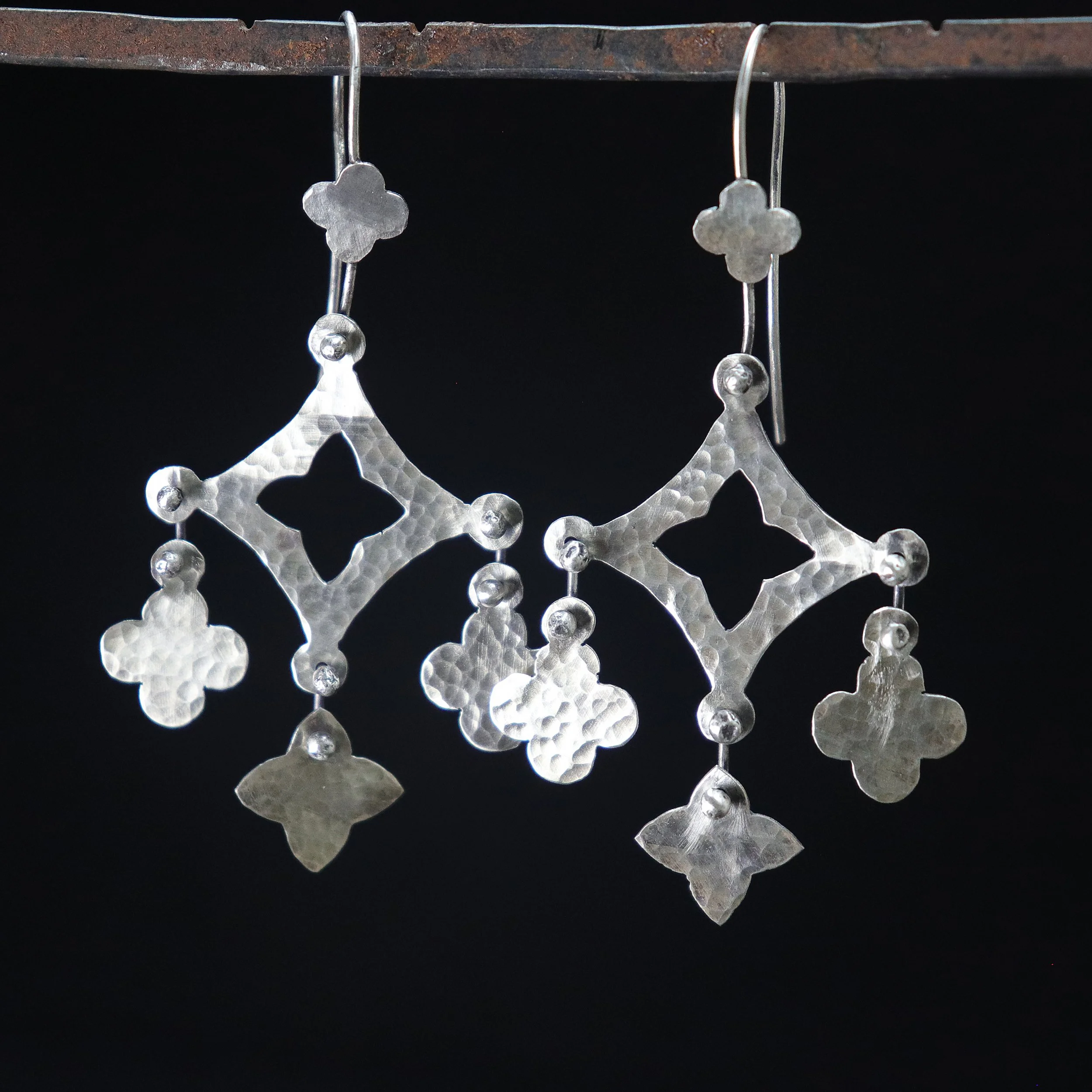 Four point star with dangles earrings.jpg