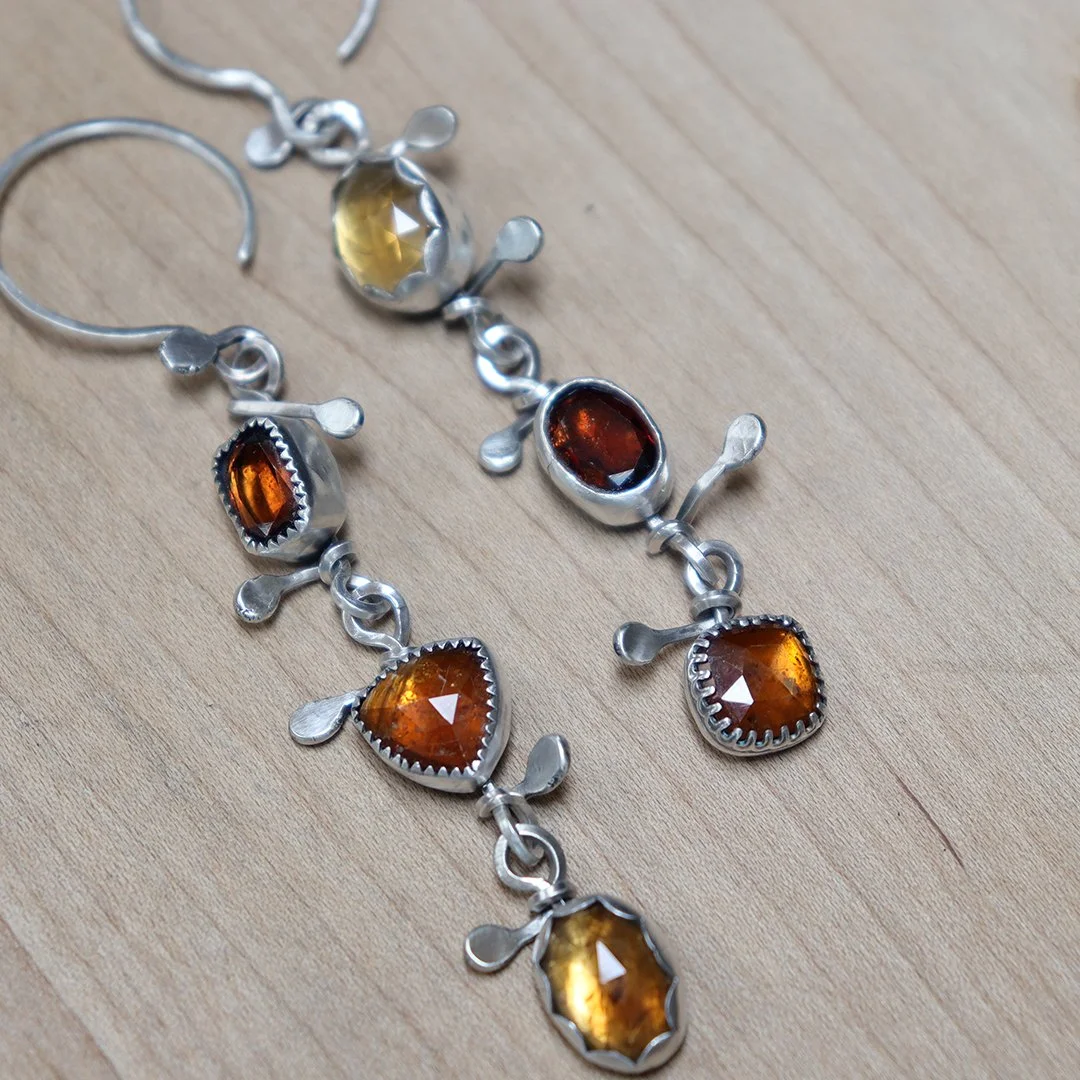 One-of-a-kind silver drop earrings featuring hessonite garnet and citrine