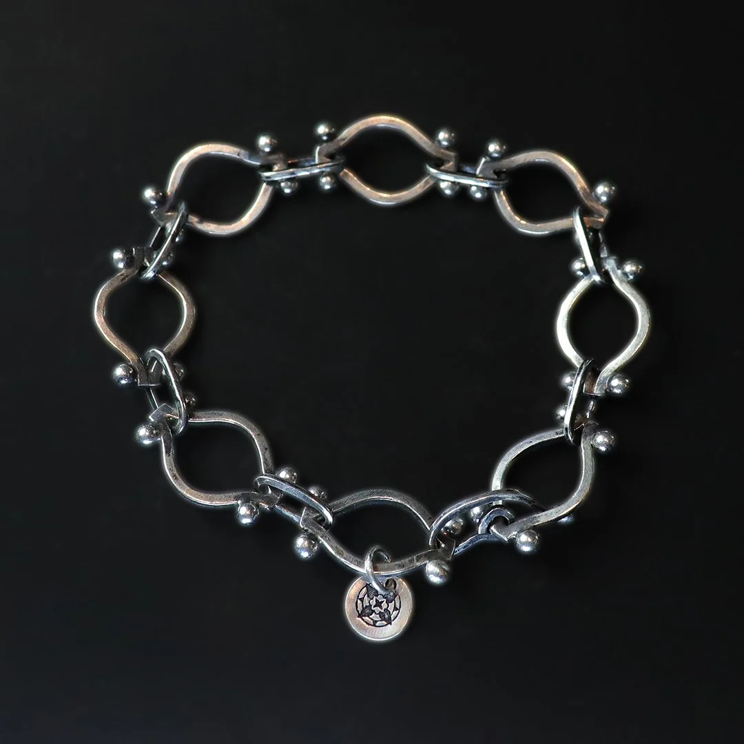 Hand-fabricated silver chain bracelet with elongated oval links