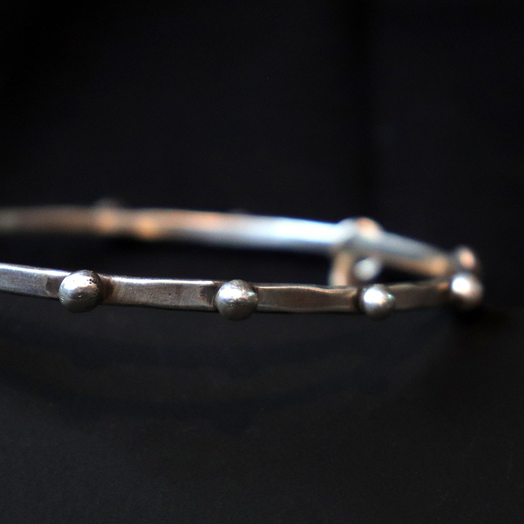 Sterling silver bangle with large granule details