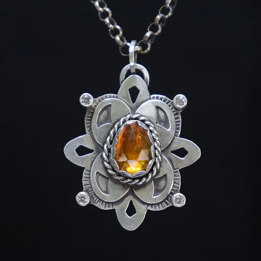 Botanical-inspired sterling silver pendant with citrine gemstone and CZ accents