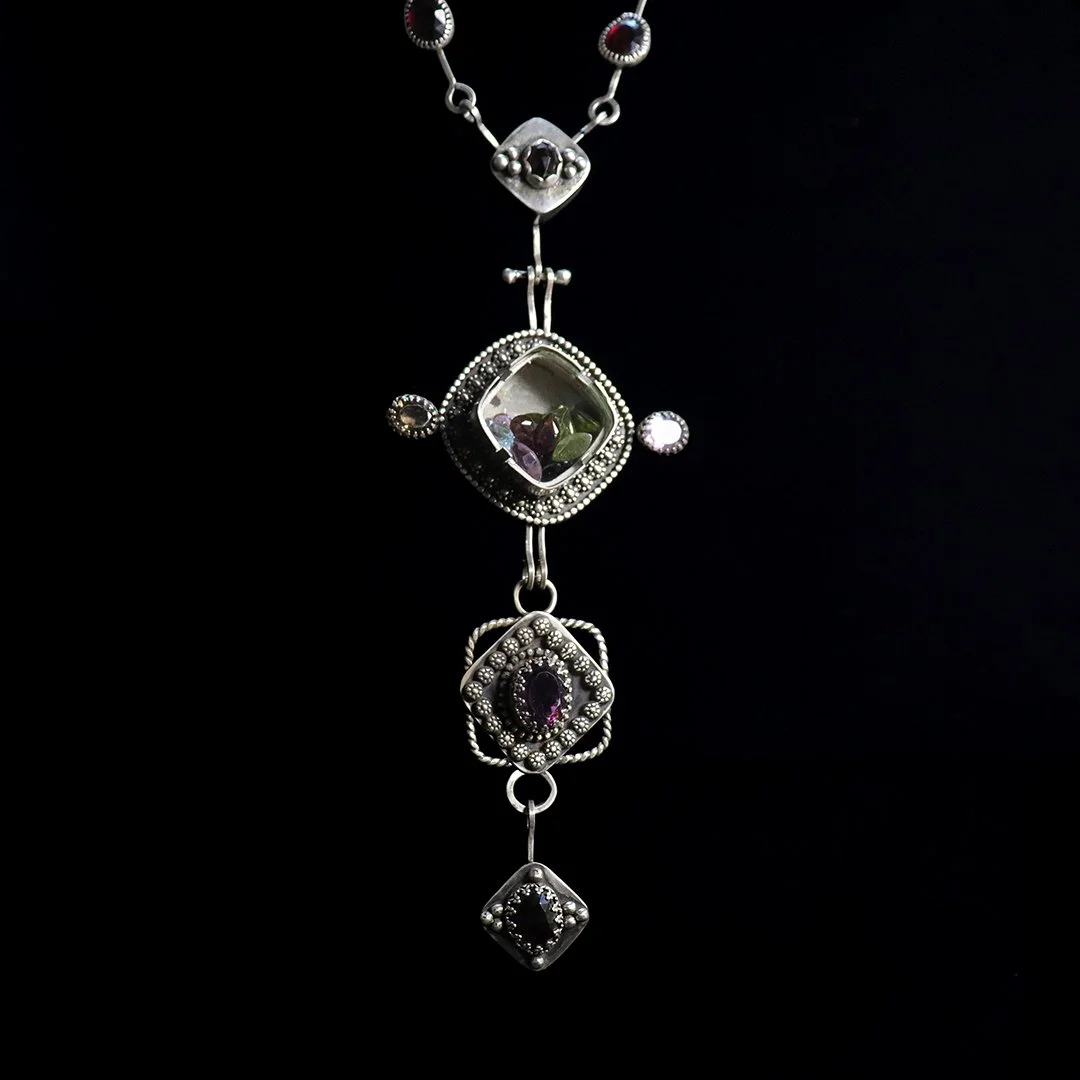 One-of-a-kind sterling silver pendant necklace with mixed gemstone details