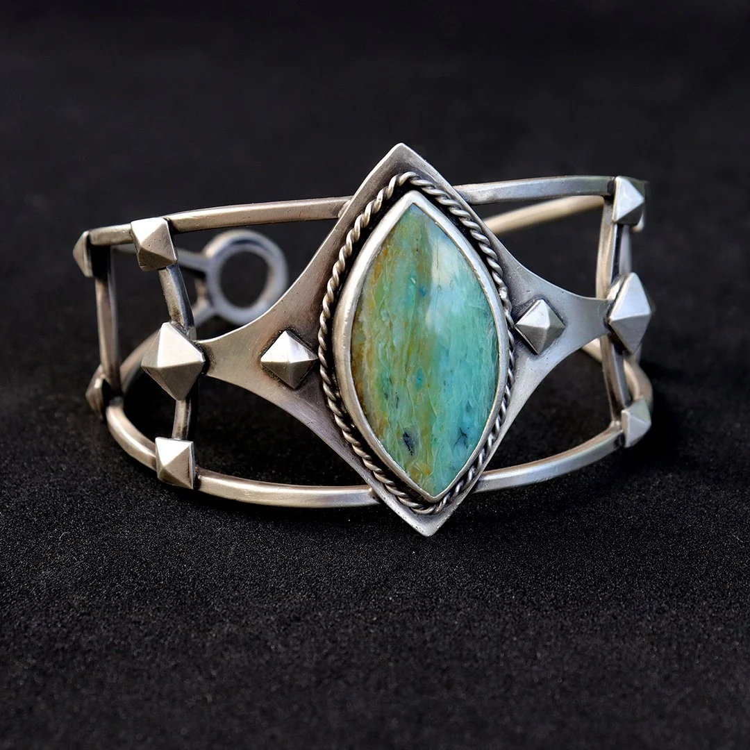 Handcrafted sterling silver cuff bracelet with marquise opalized wood gemstone