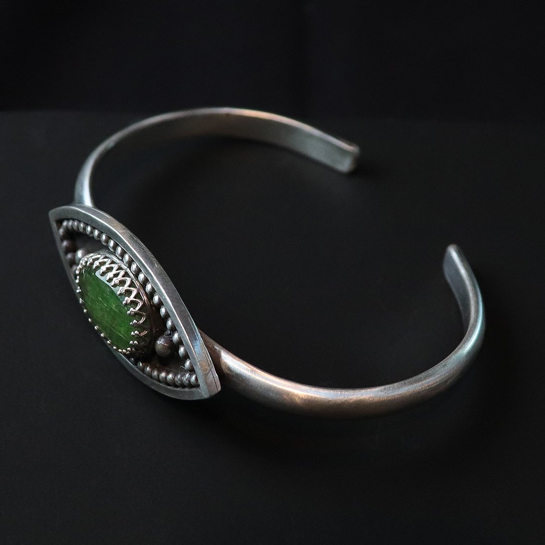 Sterling silver cuff bracelet with oval green kyanite stone