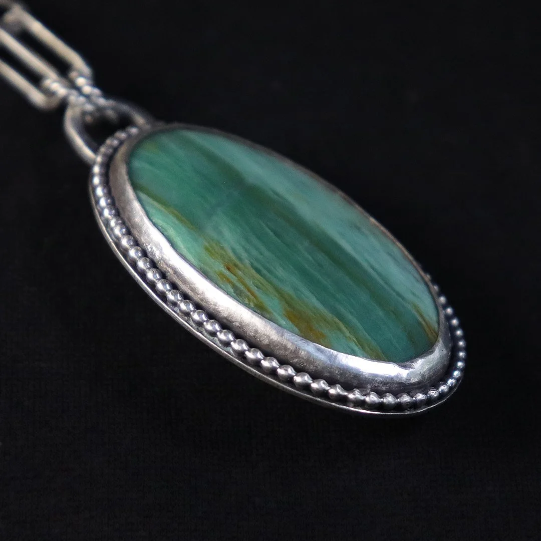 Natural opalized petrified wood jewelry pendant