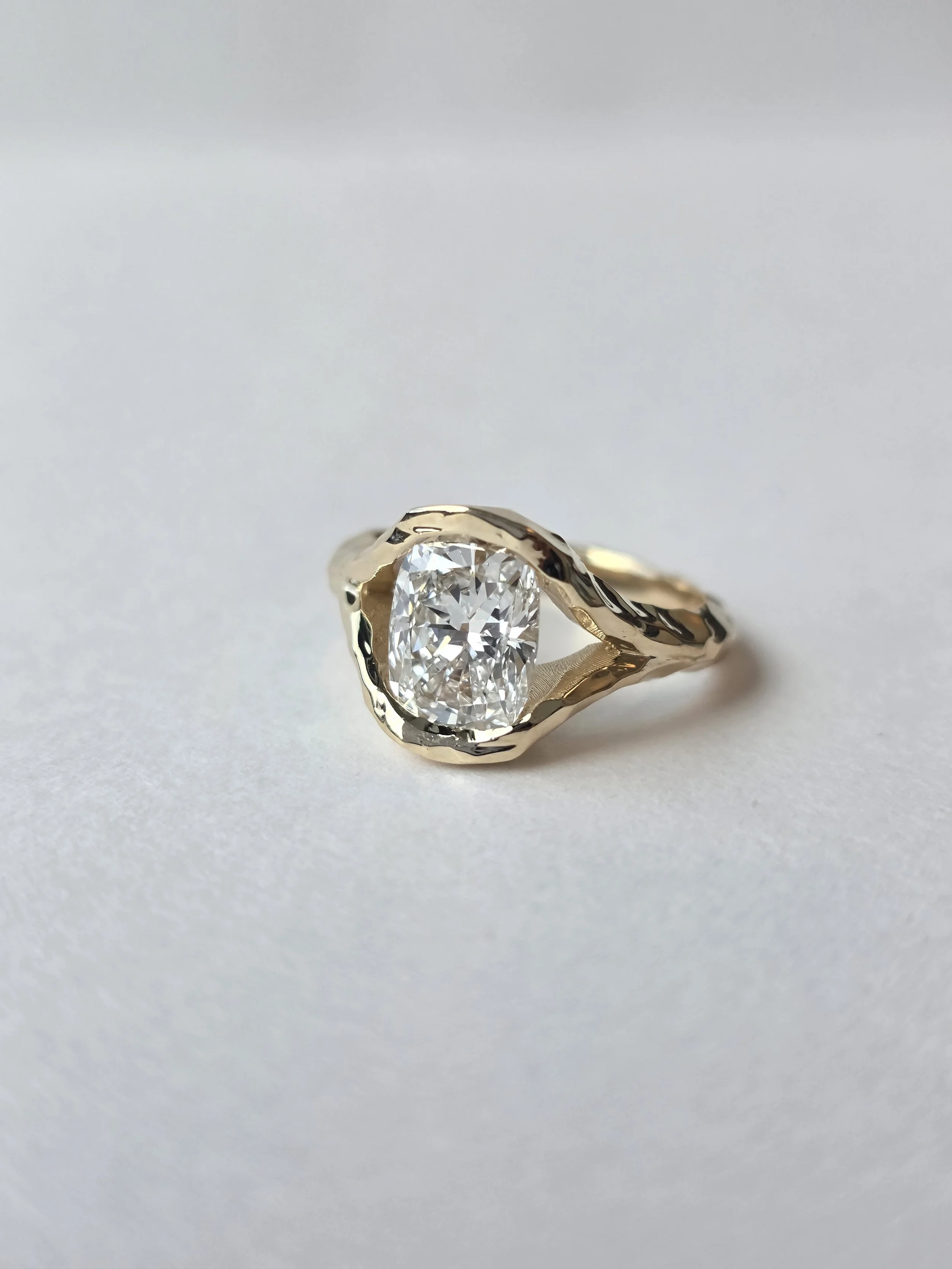 Hammered texture engagement ring
[engagement]