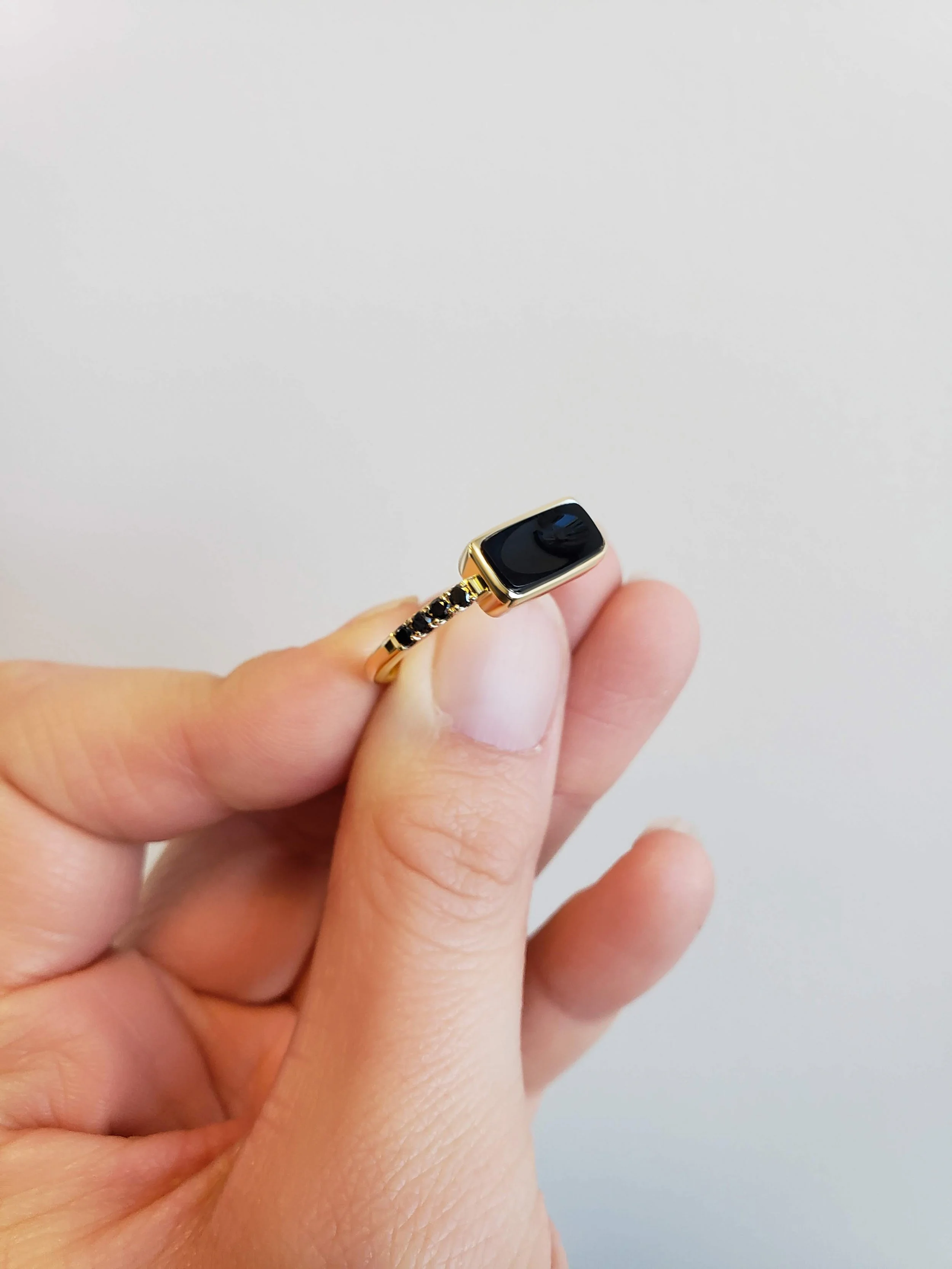 Black diamond and black onyx yellow gold engagement ring