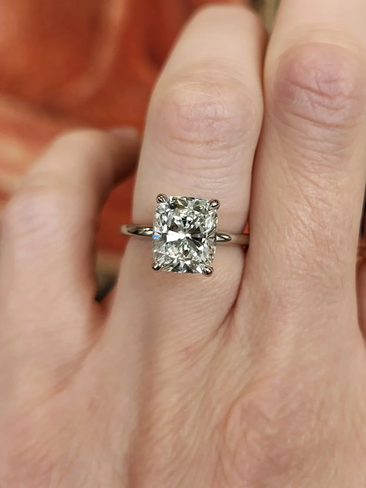 Cushion cut diamond engagement ring