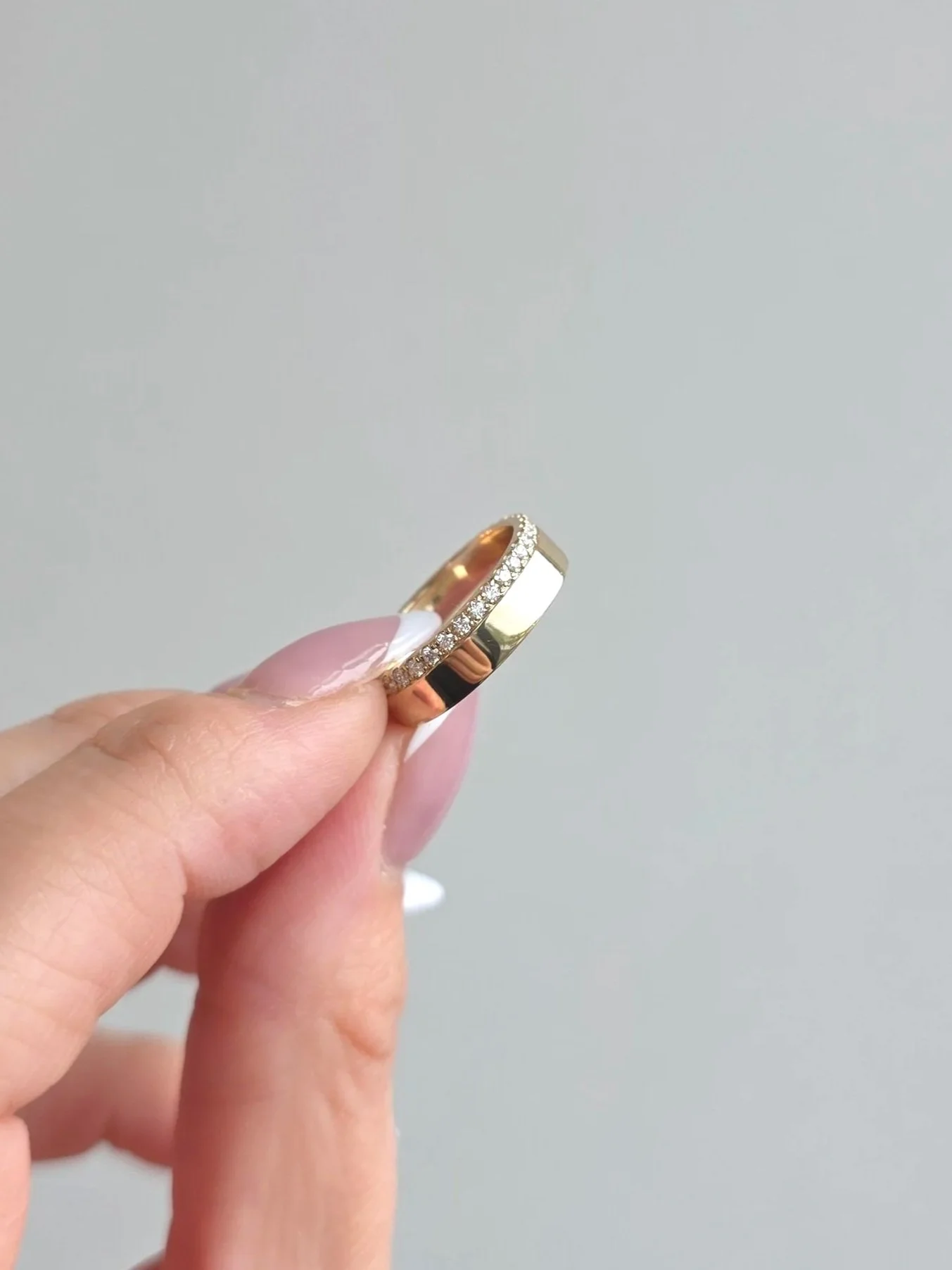 Custom yellow gold asymmetrical cigar band
[weddingbands]