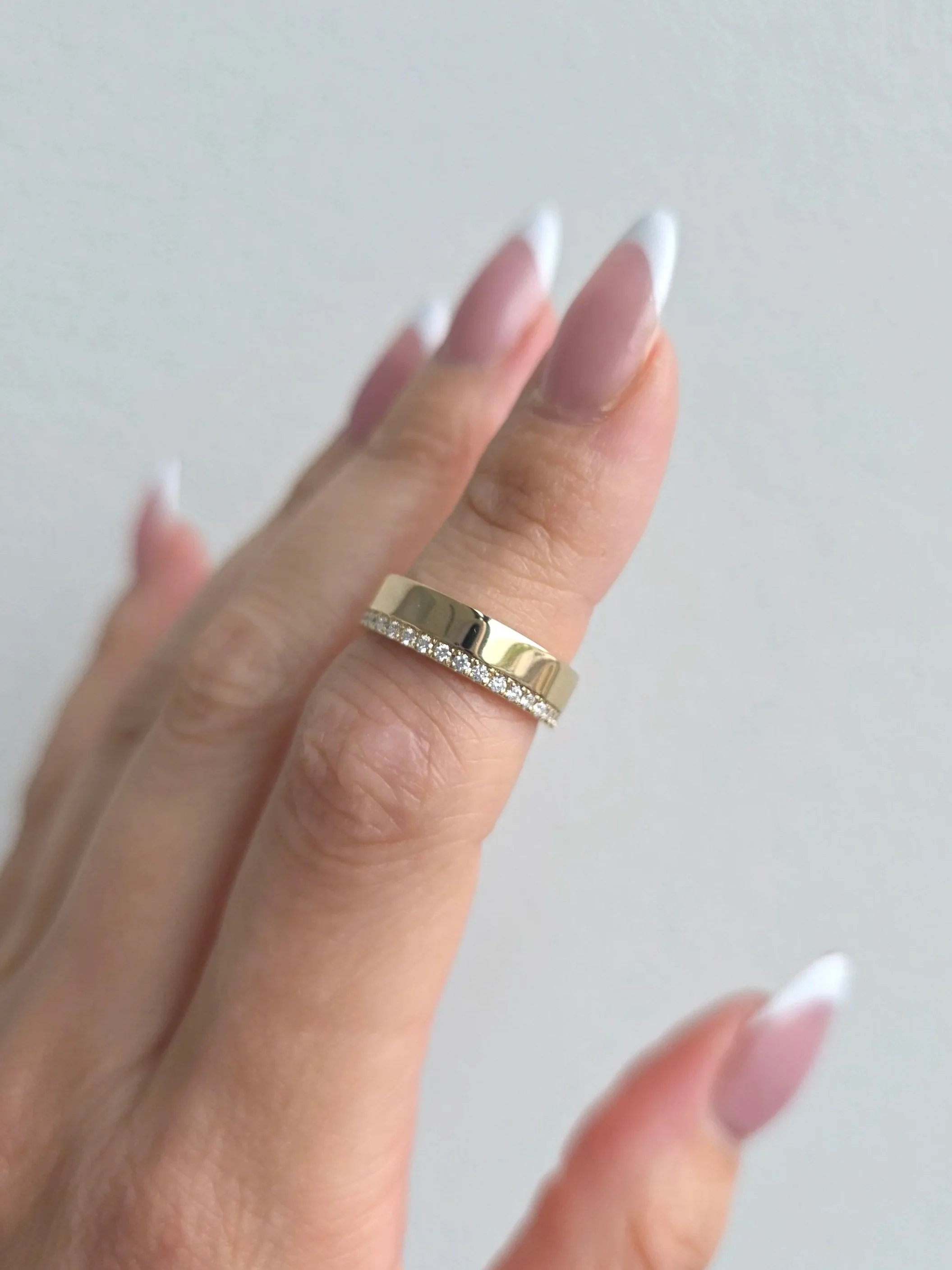 Custom yellow gold asymmetrical cigar band
[weddingbands]