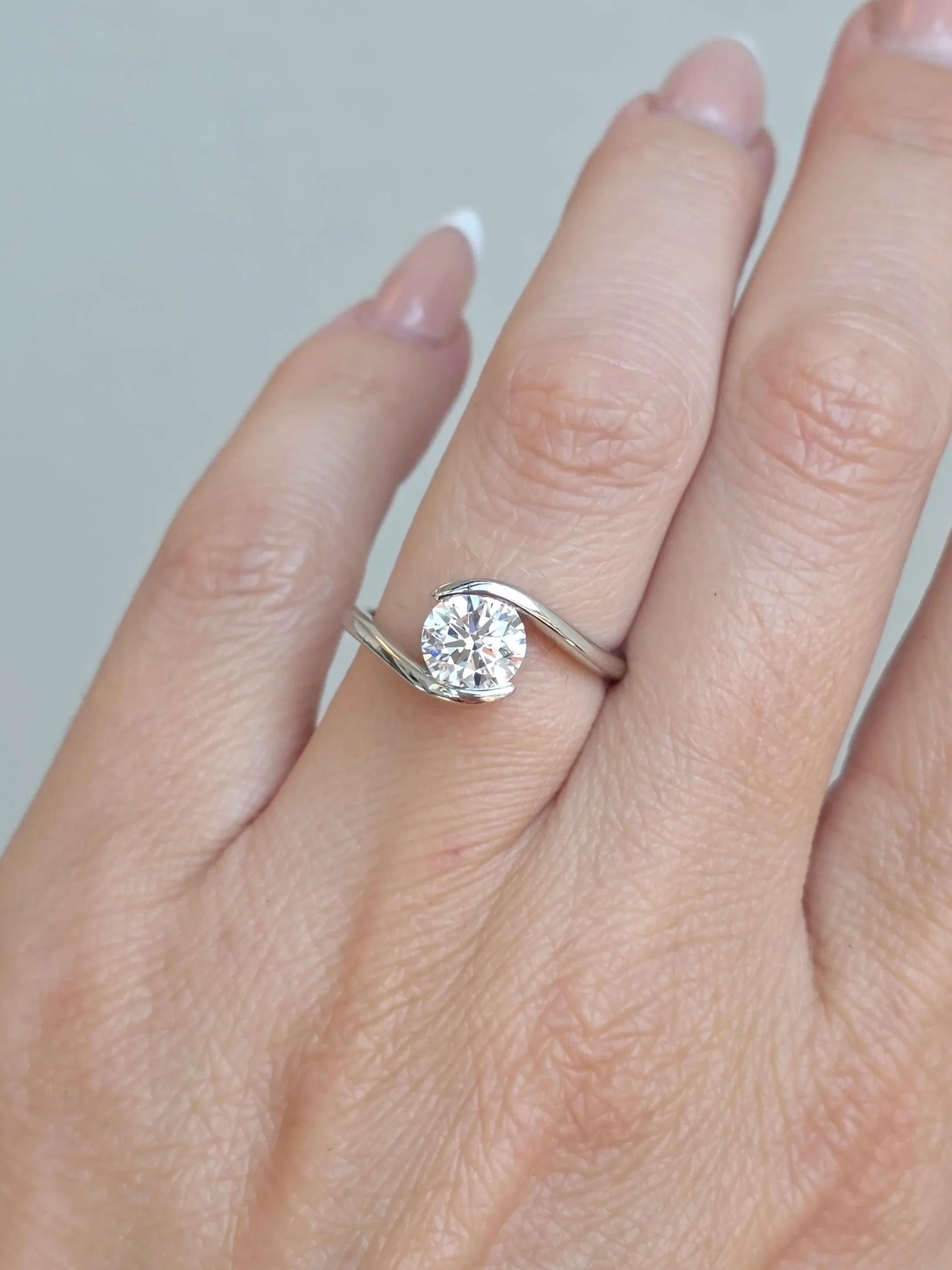 White gold bypass engagement ring
[engagement]