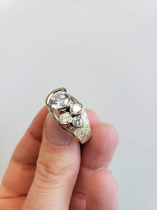 Heirloom diamond redesign project with cross hatched texture, semi-bezel and bezel set diamonds in yellow and white gold