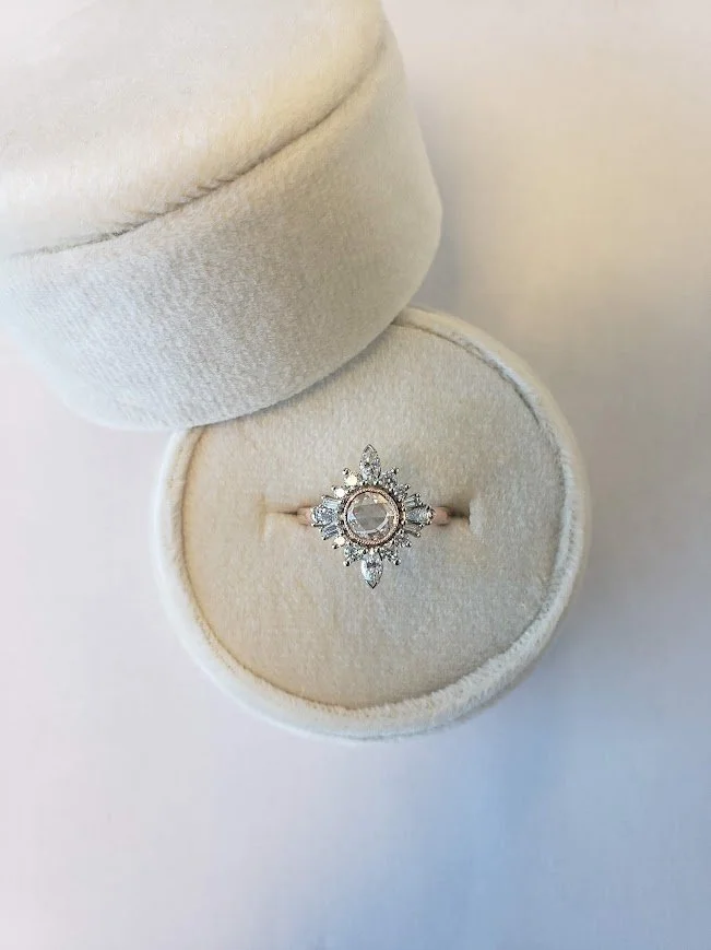 Custom engagement ring with milgrain bezel set rose cut centre, accented with marquise and round brilliant cut diamonds, 14K rose gold.