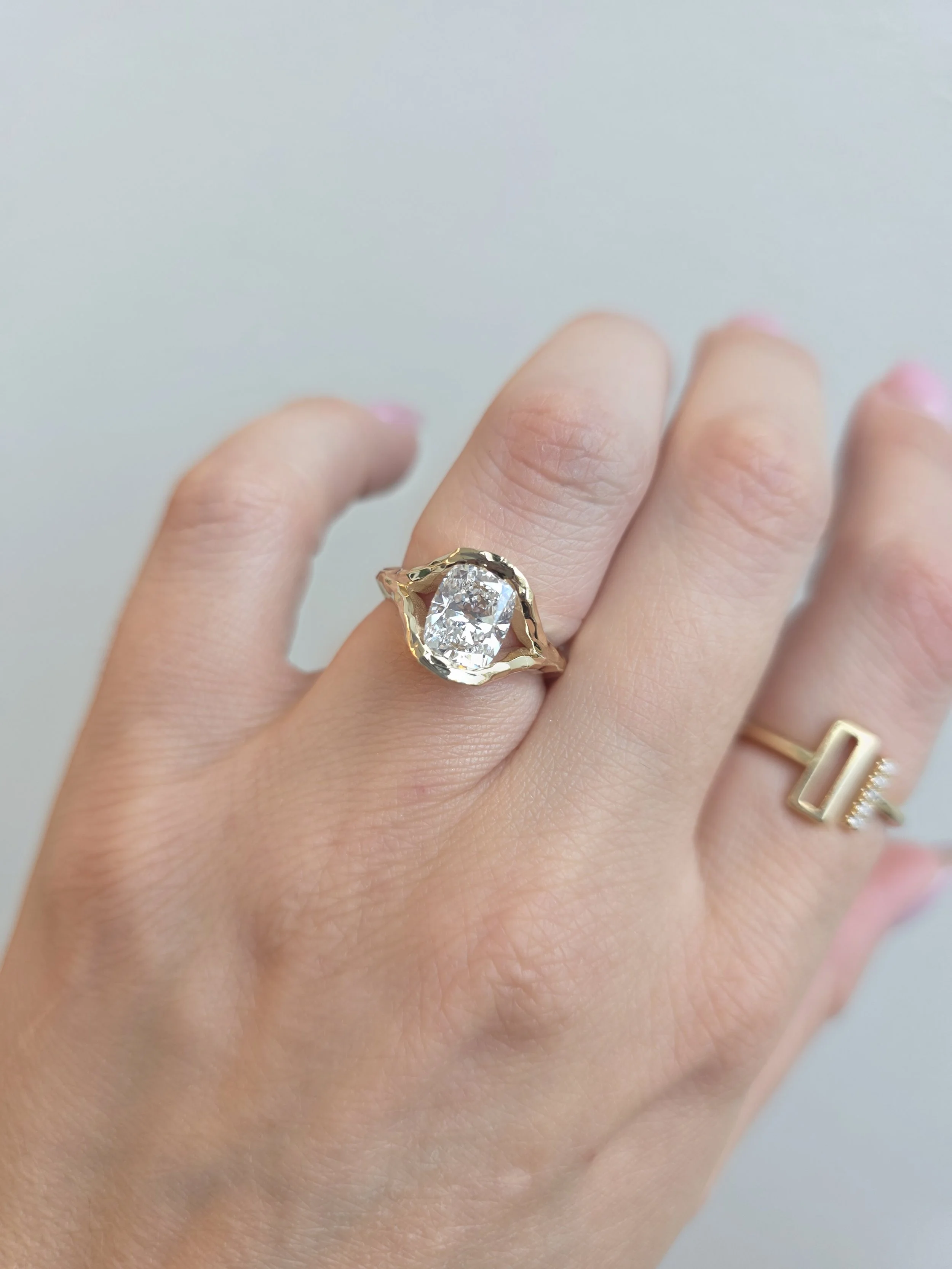 Hammered texture engagement ring
[engagement]