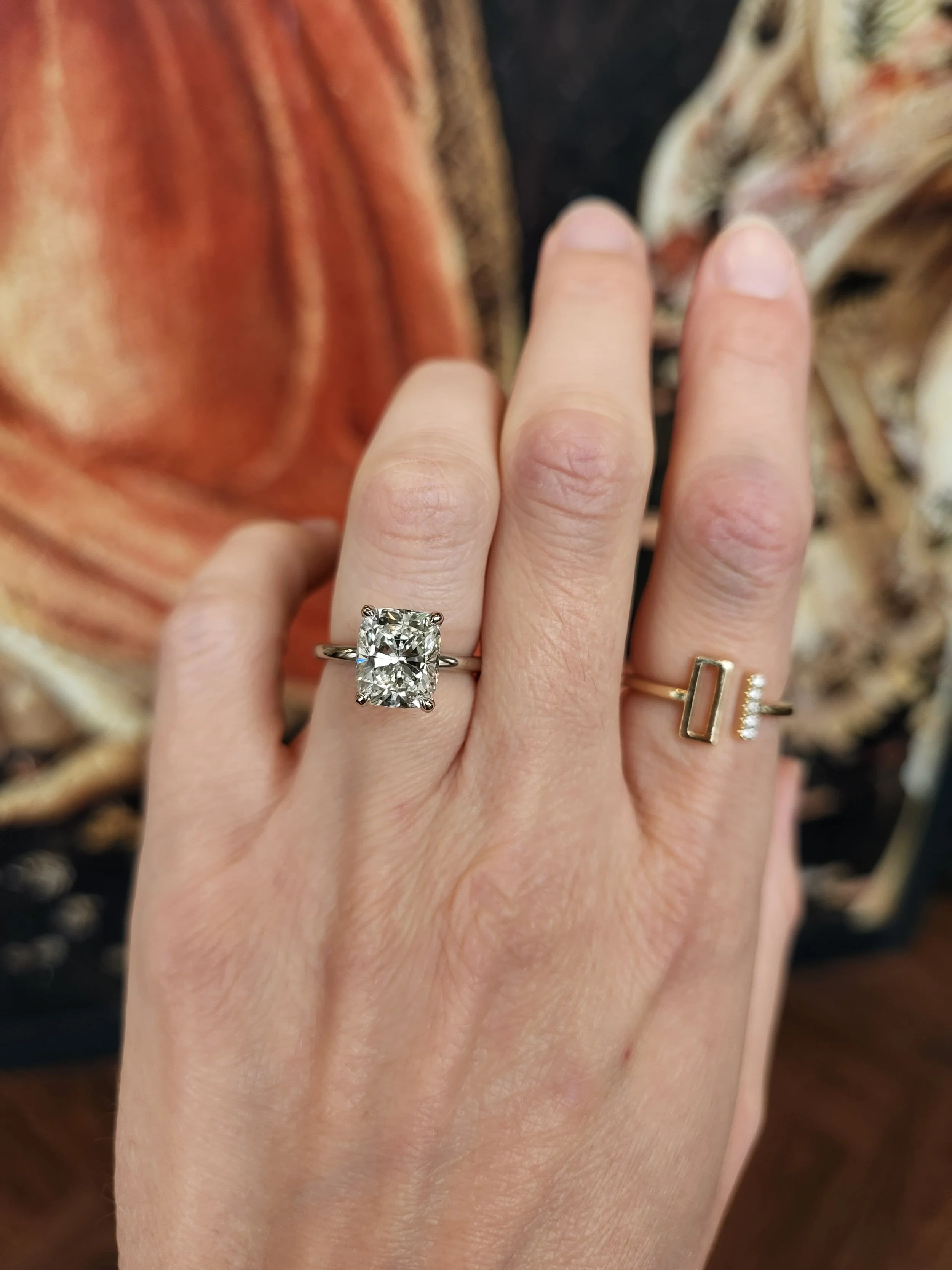 Cushion cut diamond engagement ring