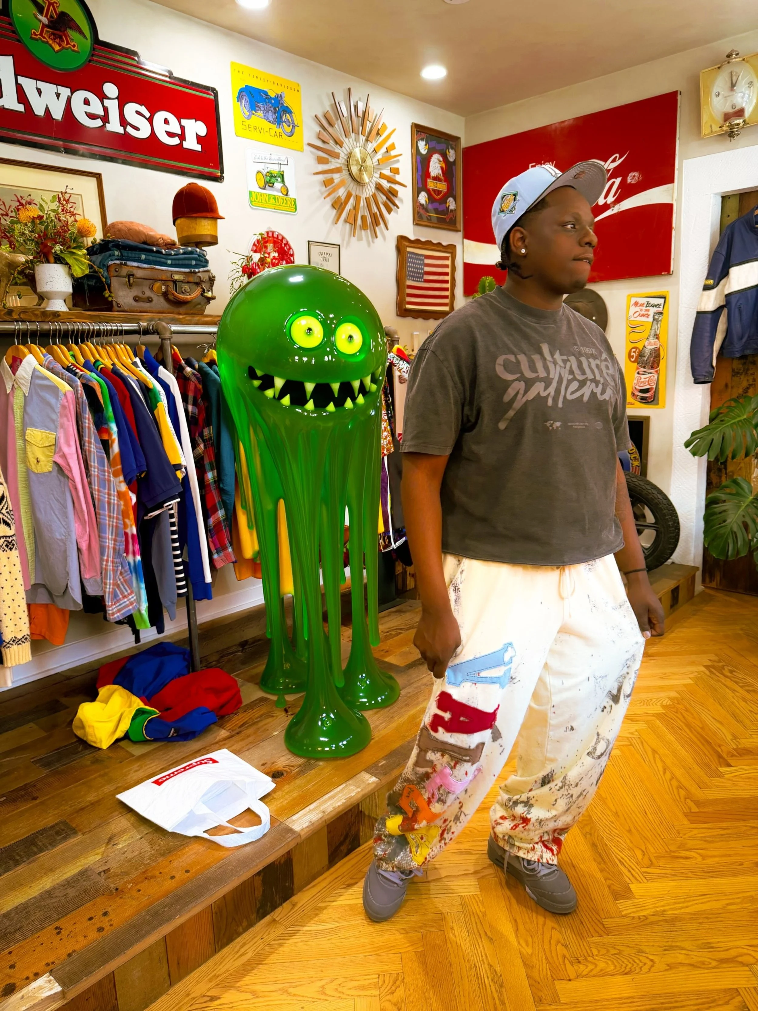 Firefly_Create a large, photorealistic green slime monster with a semi-transparent gelatinous.jpg