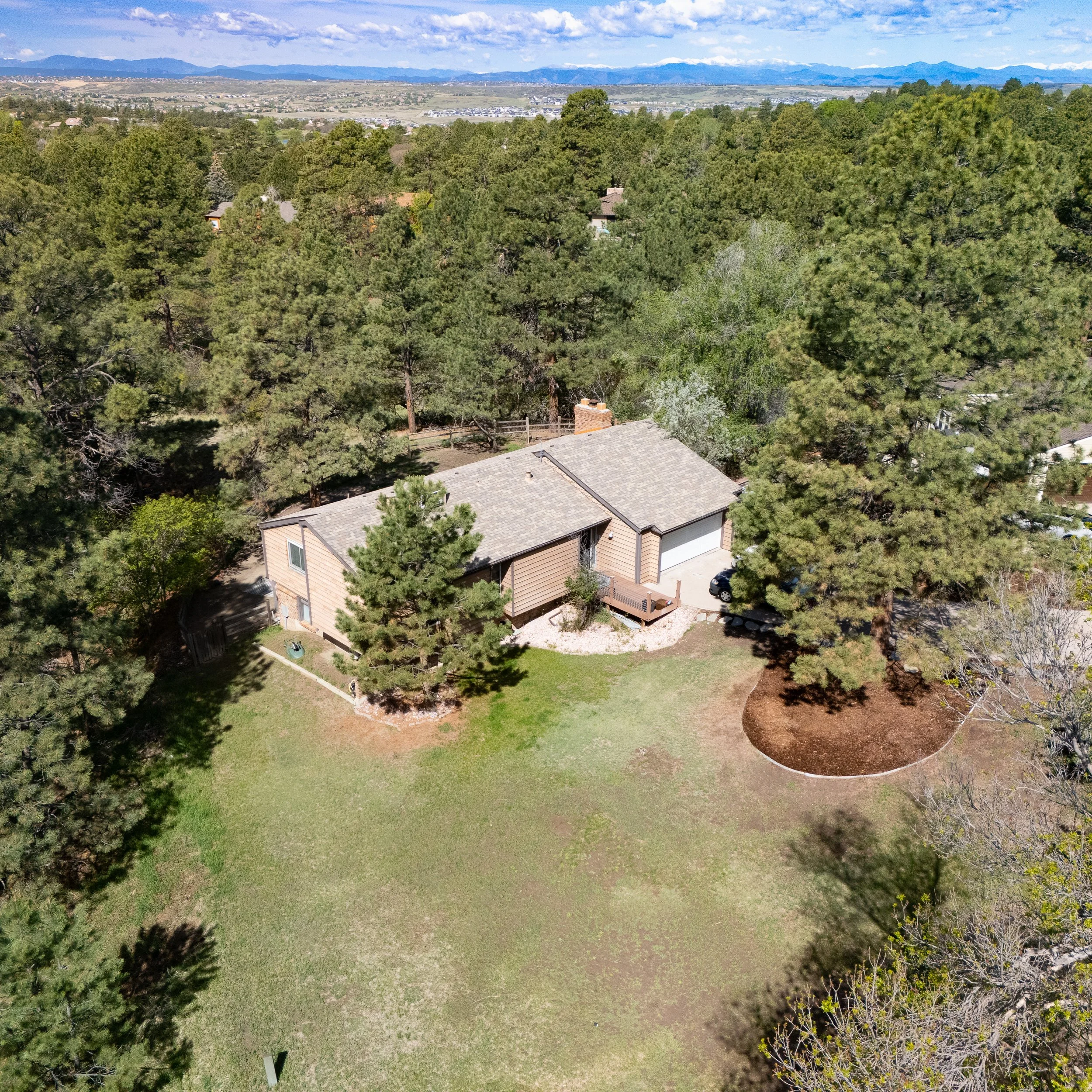 Drone side view with mountains square-1.jpg