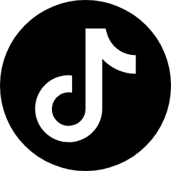 A black silhouette of a person riding a bicycle, with the bicycle's wheels, frame, and handlebars visible against a plain white background.