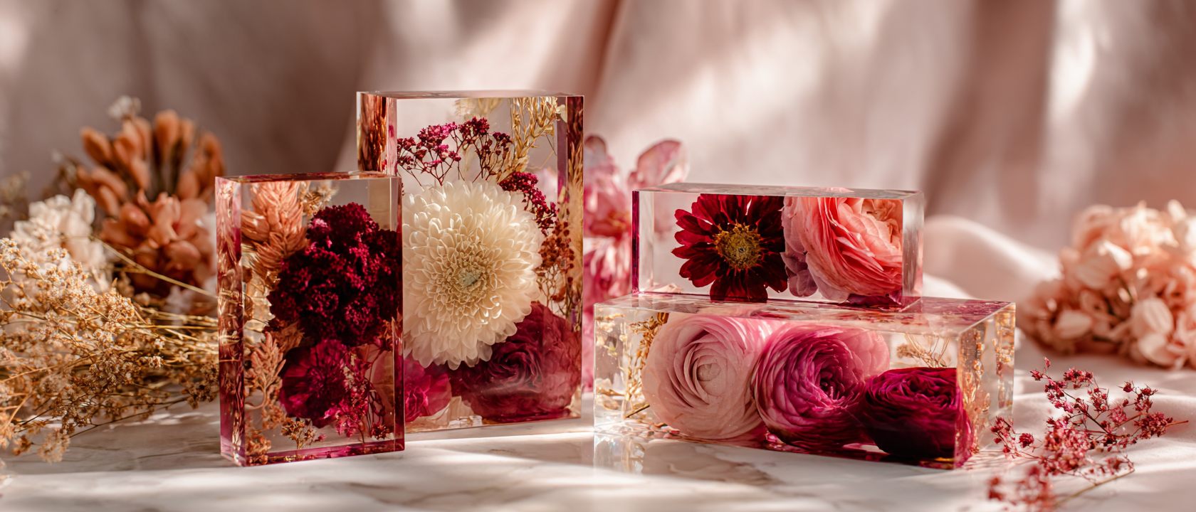 Wedding Bouquet Preservation - Set of resin flower preservation designs on a table.png
