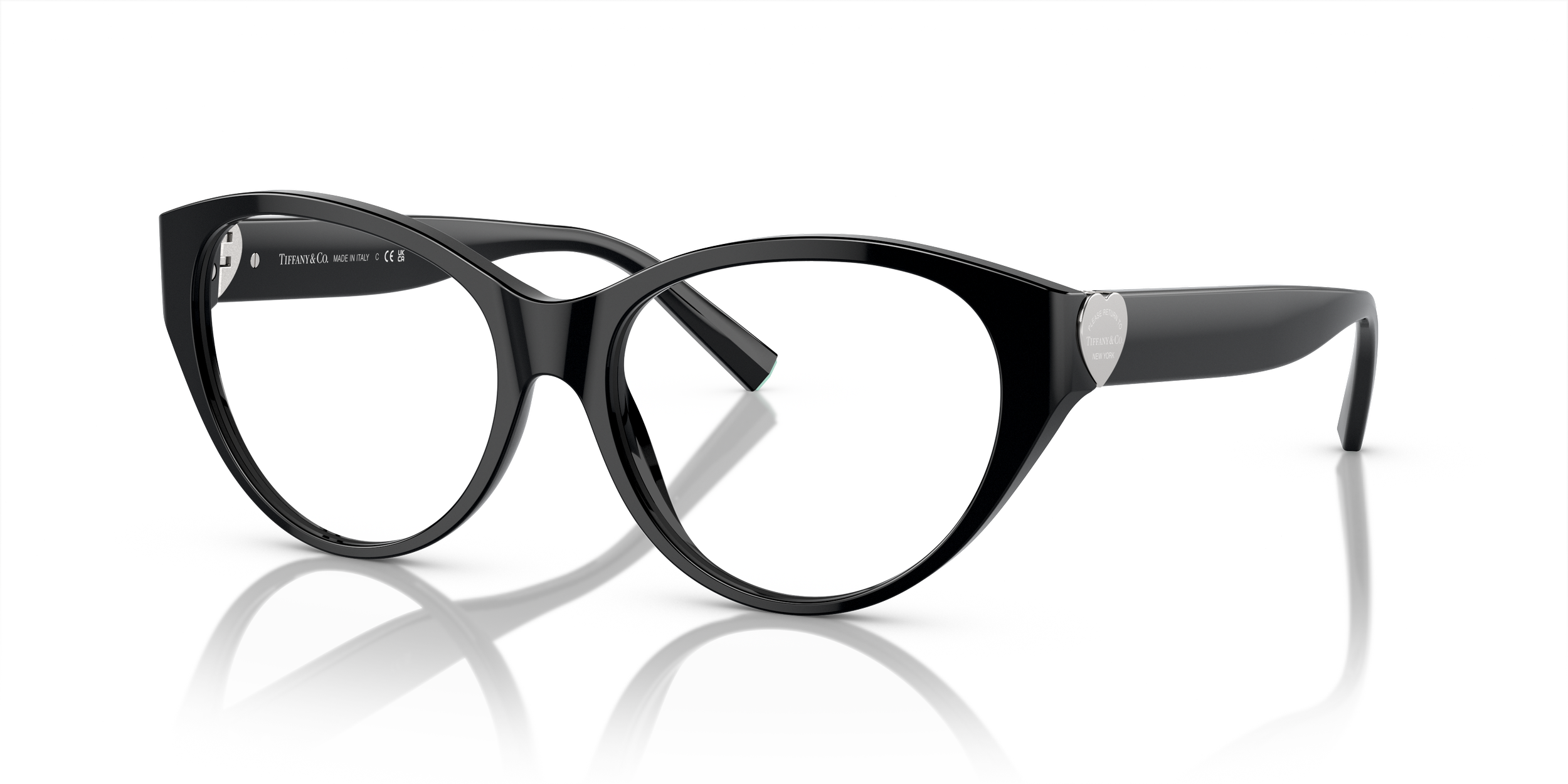 Black Tiffany designer glasses with a rounded frame and heart-shaped logo on the temple, displayed on a reflective surface.