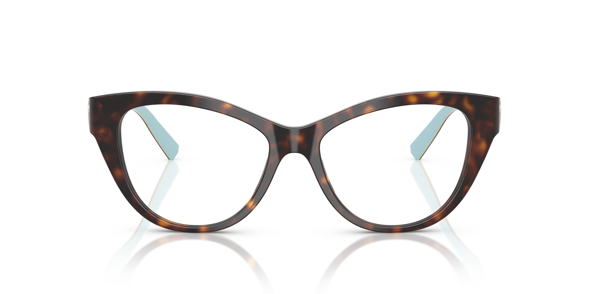 Tiffany designer glasses with a tortoiseshell-pattern, with white temples and clear lenses, reflected on a glossy surface.