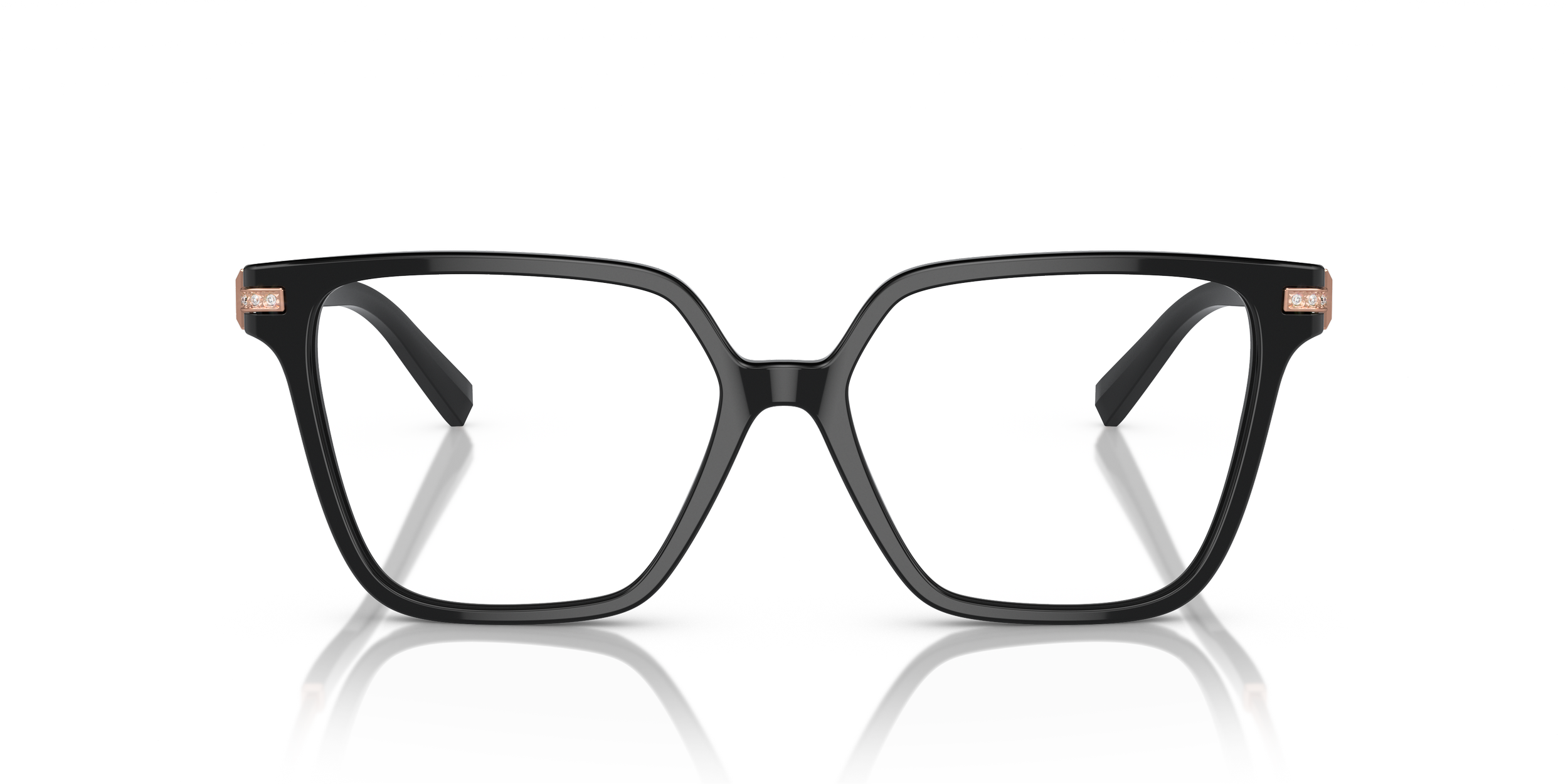Black rectangular Tiffany designer eyeglasses with small decorative accents on the top corners of the frames, reflected on a glossy surface.