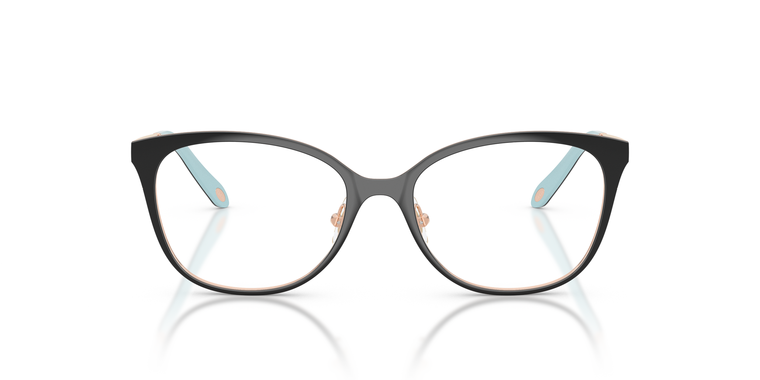 A pair of fashionable Tiffany & Co. eyeglasses with black frames, rose gold accents, and light blue temples, reflected on a white surface.
