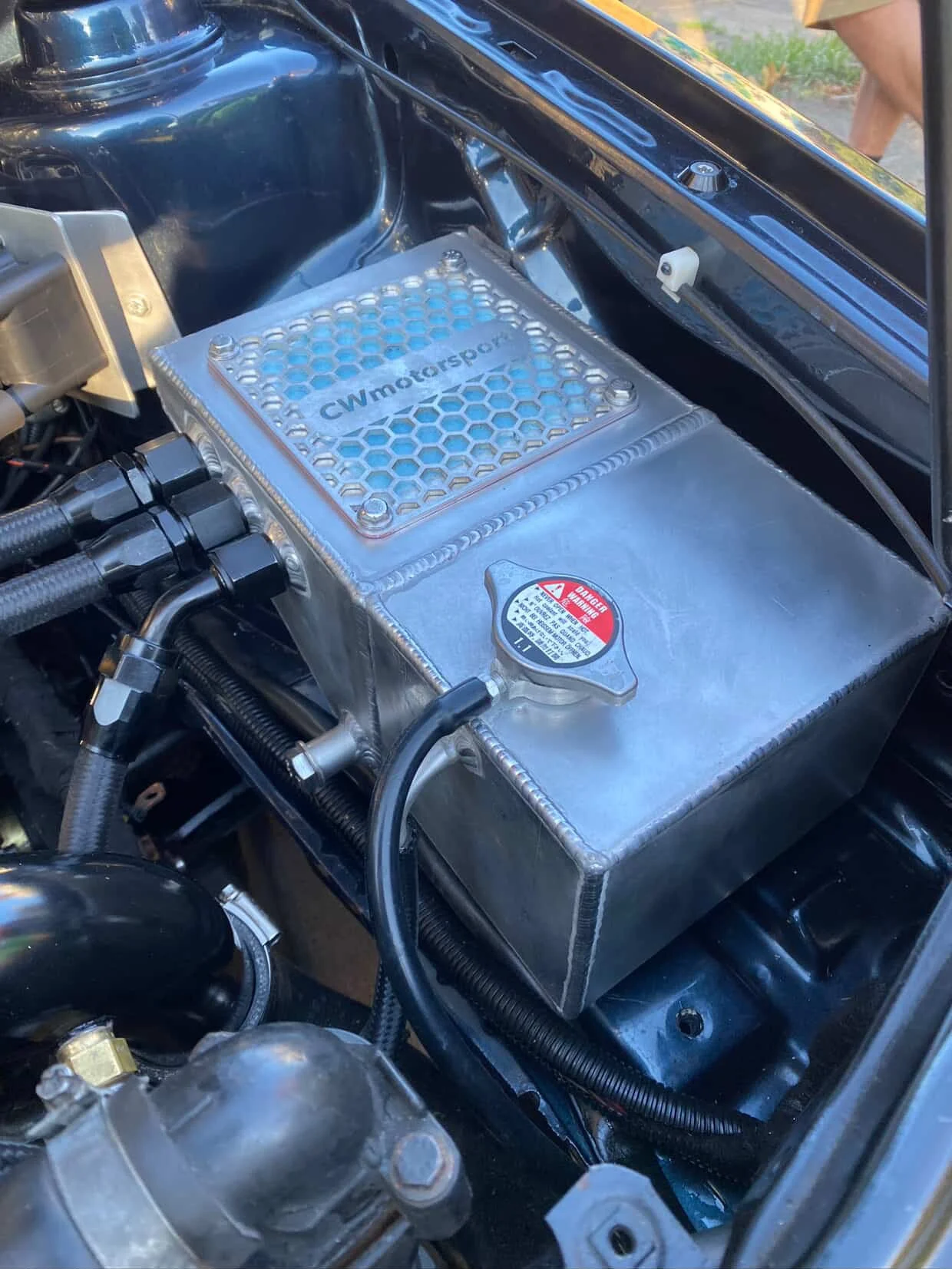 Expansion tank with catch can